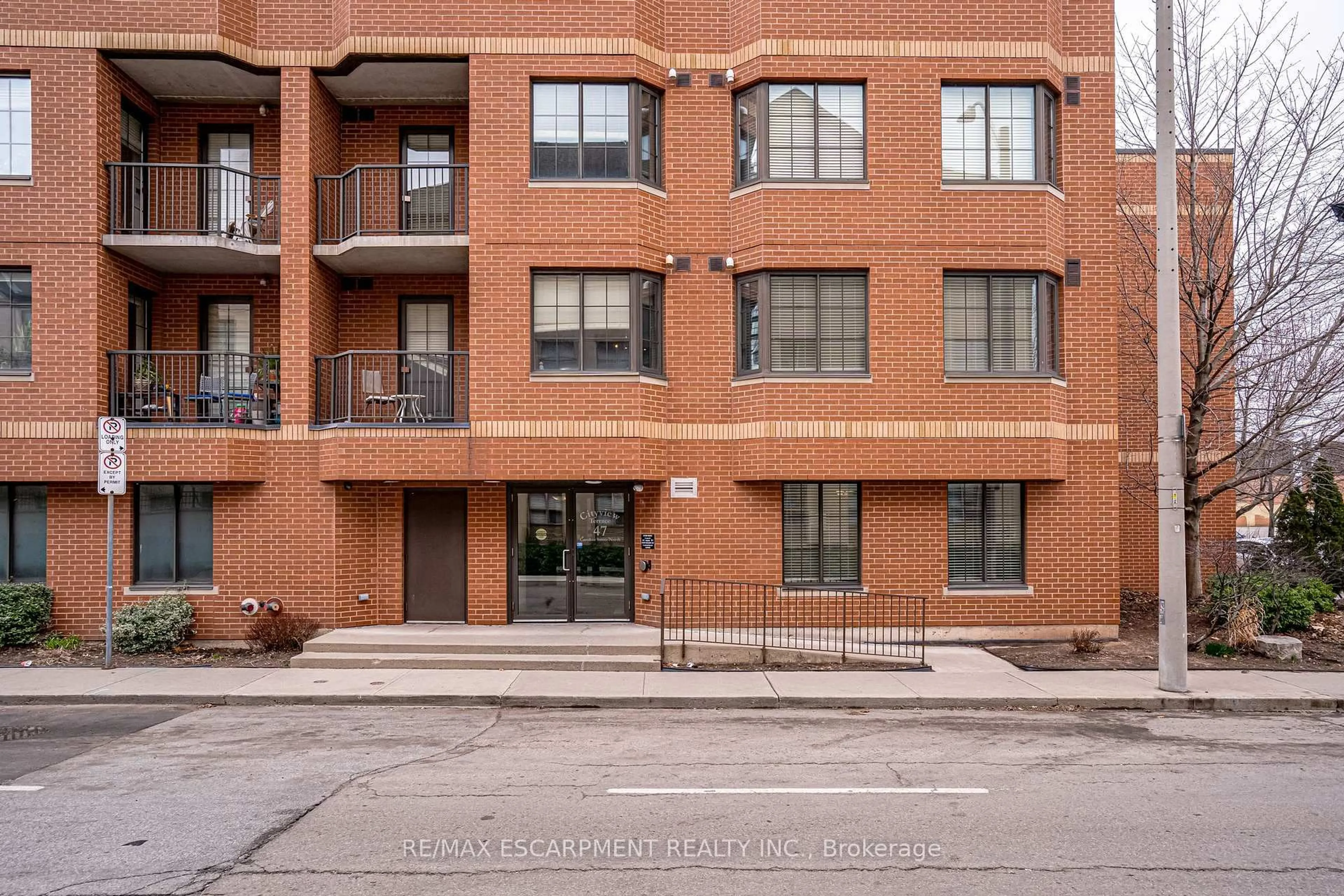 Home with brick exterior material, unknown for 47 Caroline St #210, Hamilton Ontario L8R 2R6