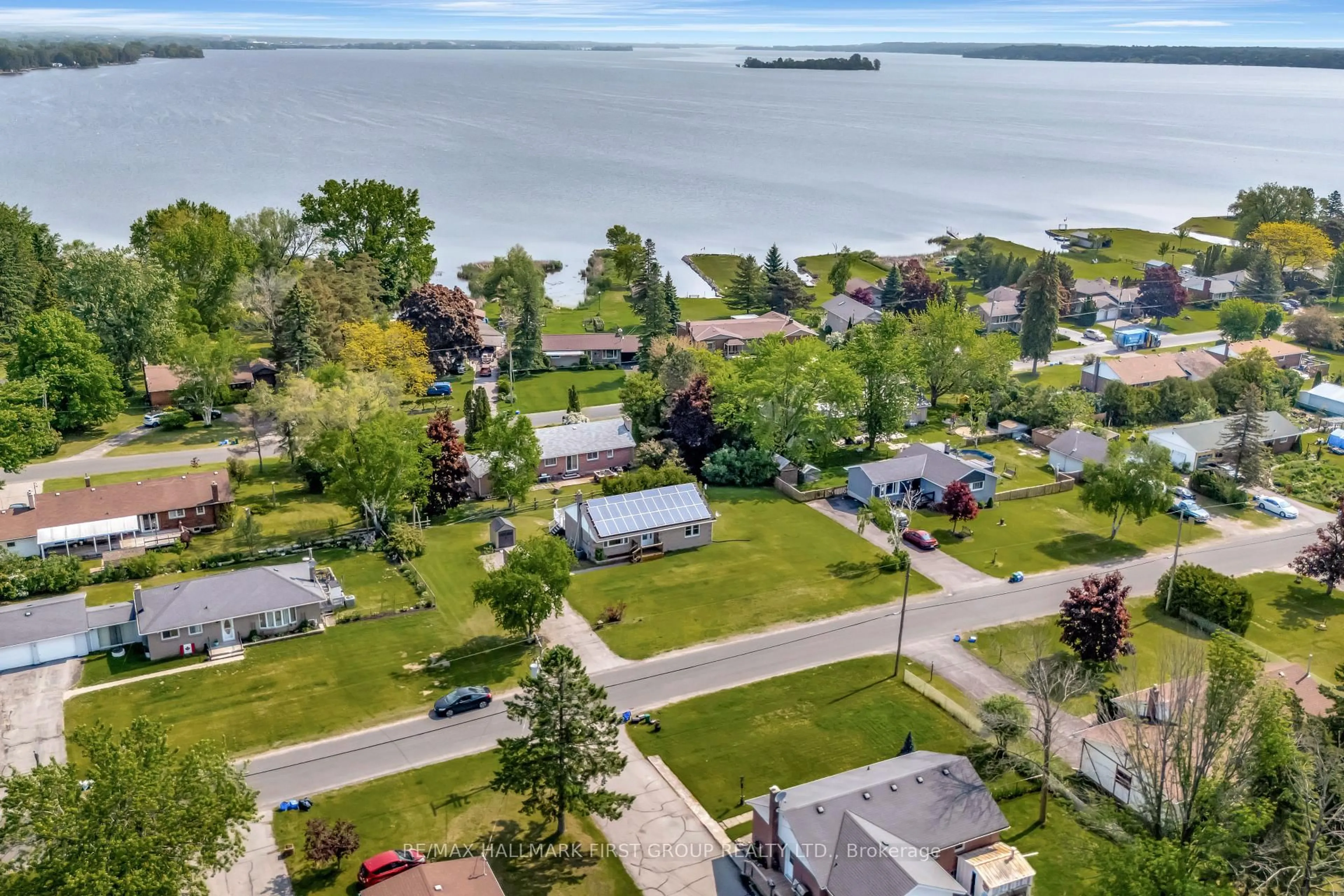 A pic from outside/outdoor area/front of a property/back of a property/a pic from drone, water/lake/river/ocean view for 12 Roseland Dr, Quinte West Ontario K0K 1L0