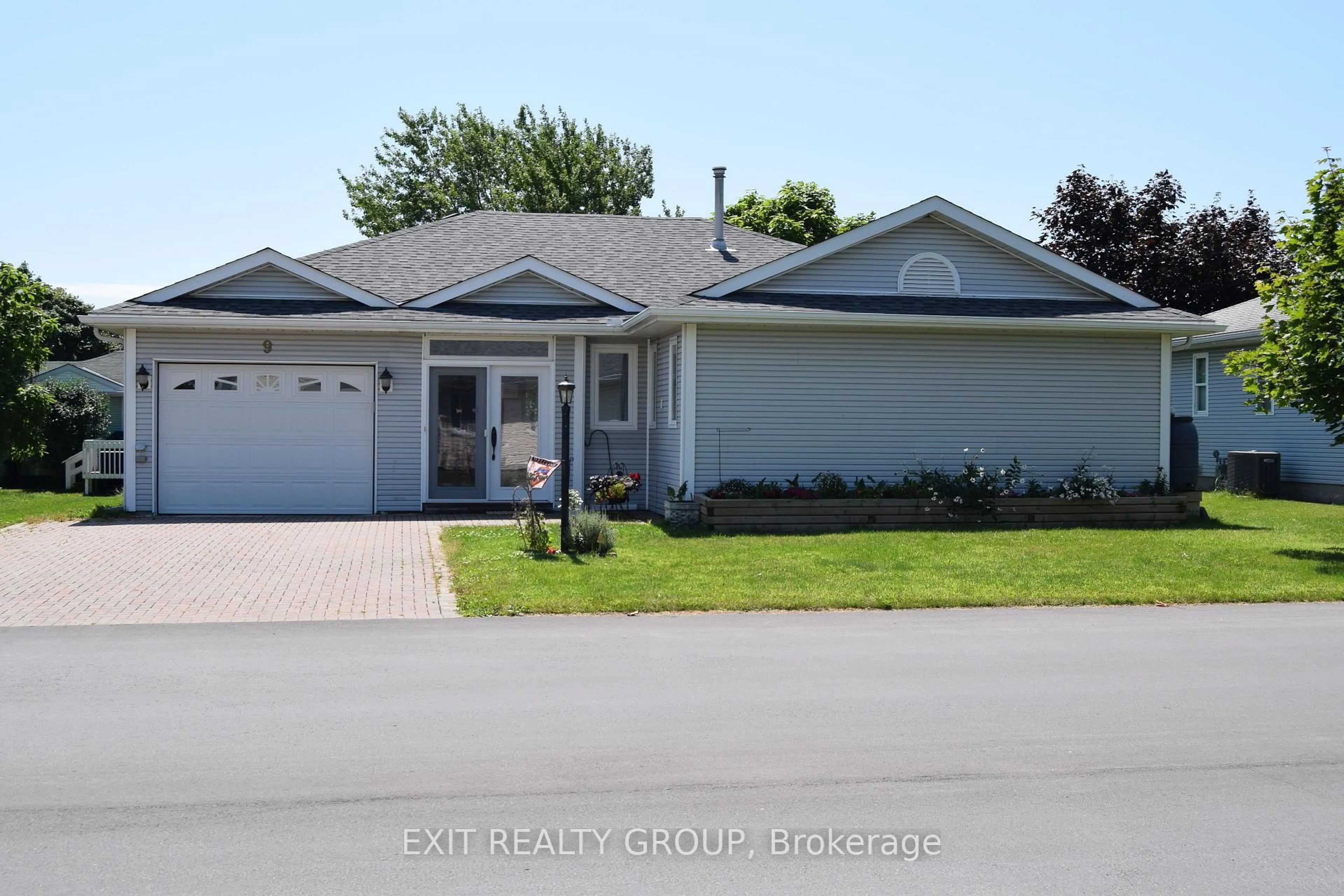 Home with vinyl exterior material, street for 9 Empire Blvd, Prince Edward County Ontario K0K 3L0