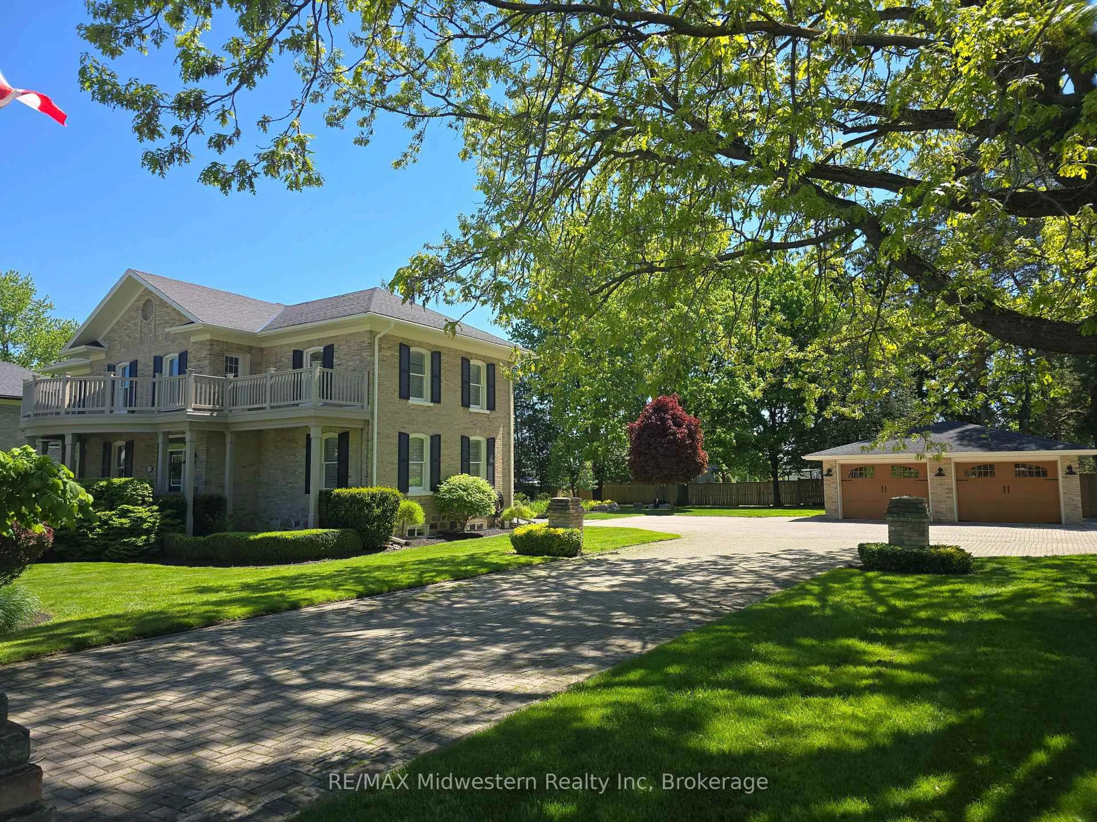 A pic from outside/outdoor area/front of a property/back of a property/a pic from drone, street for 179 Main St, North Perth Ontario N0G 1B0