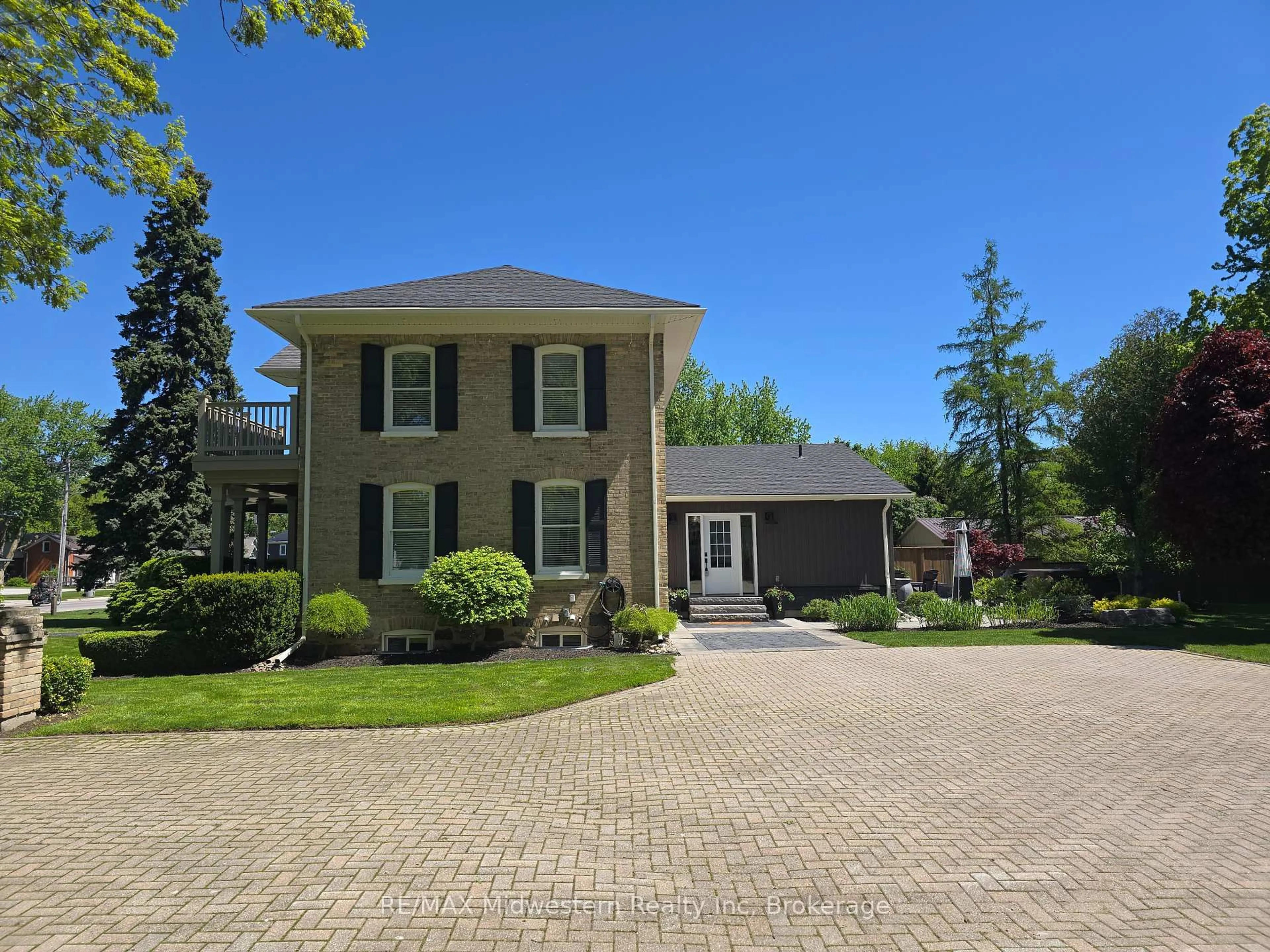 A pic from outside/outdoor area/front of a property/back of a property/a pic from drone, street for 179 Main St, North Perth Ontario N0G 1B0