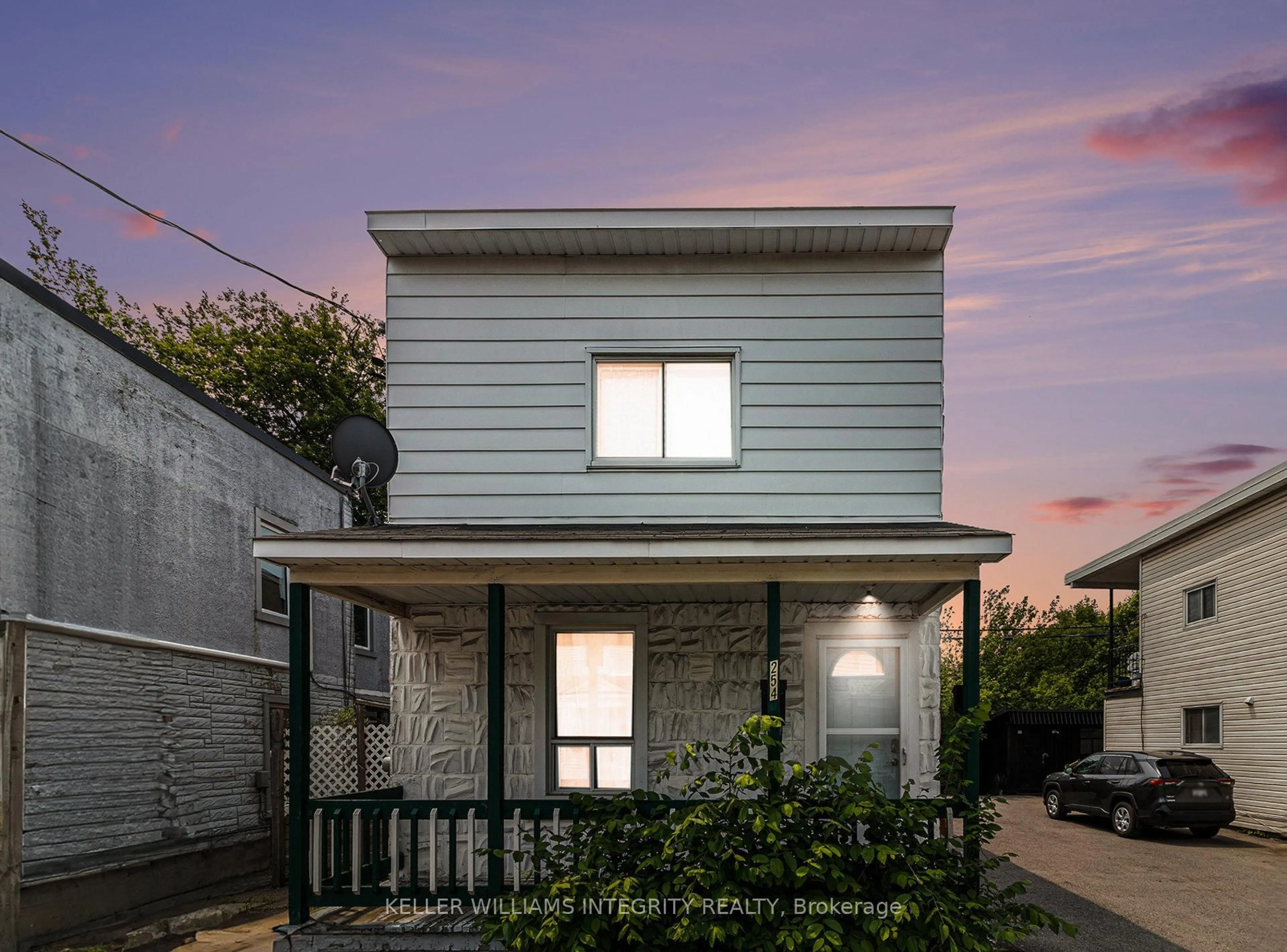 Home with vinyl exterior material, street for 254 Emond St, Ottawa Ontario K1L 7R8