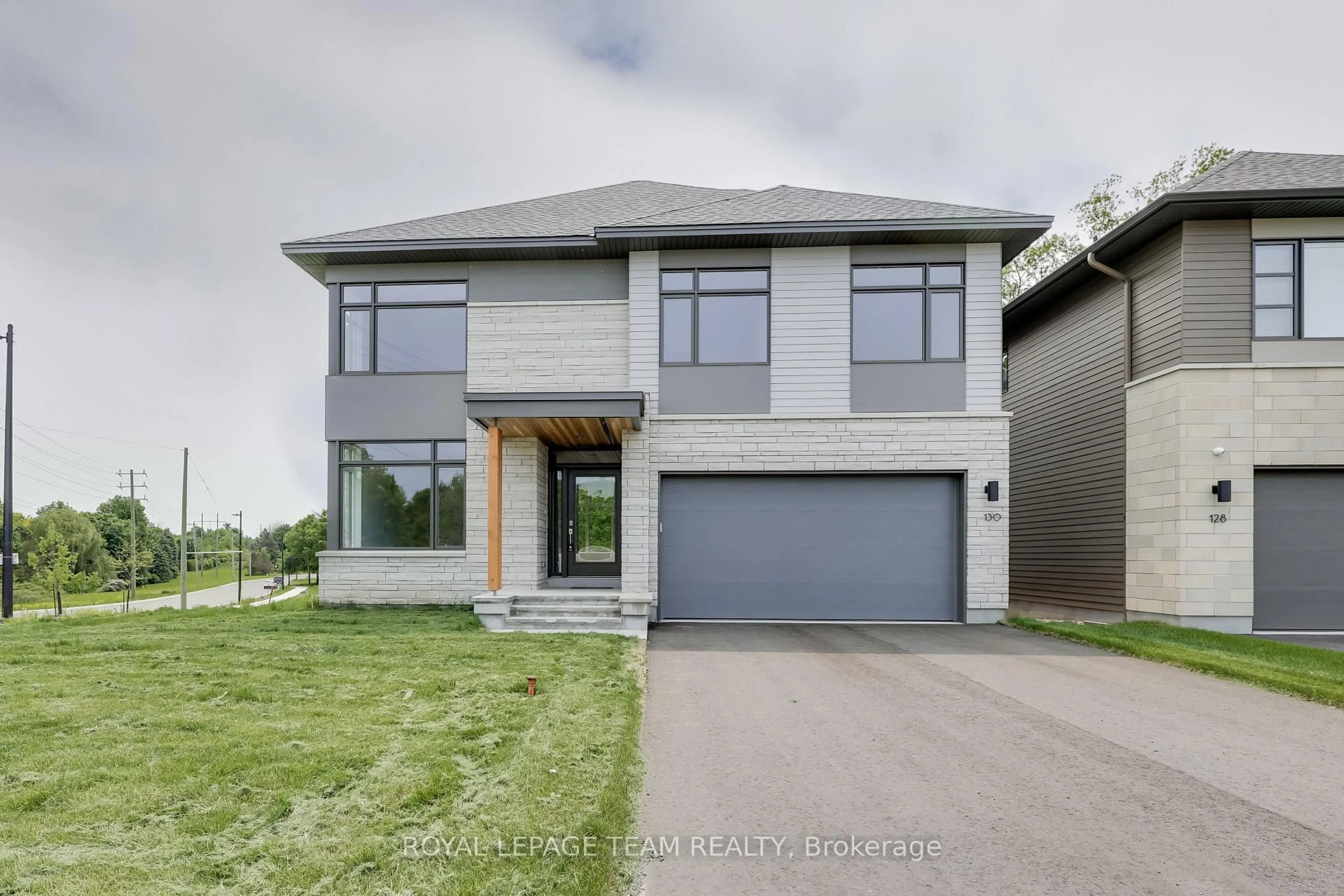 Home with brick exterior material, street for 130 IRON BRIDGE Pl, Kanata Ontario K2K 0N4