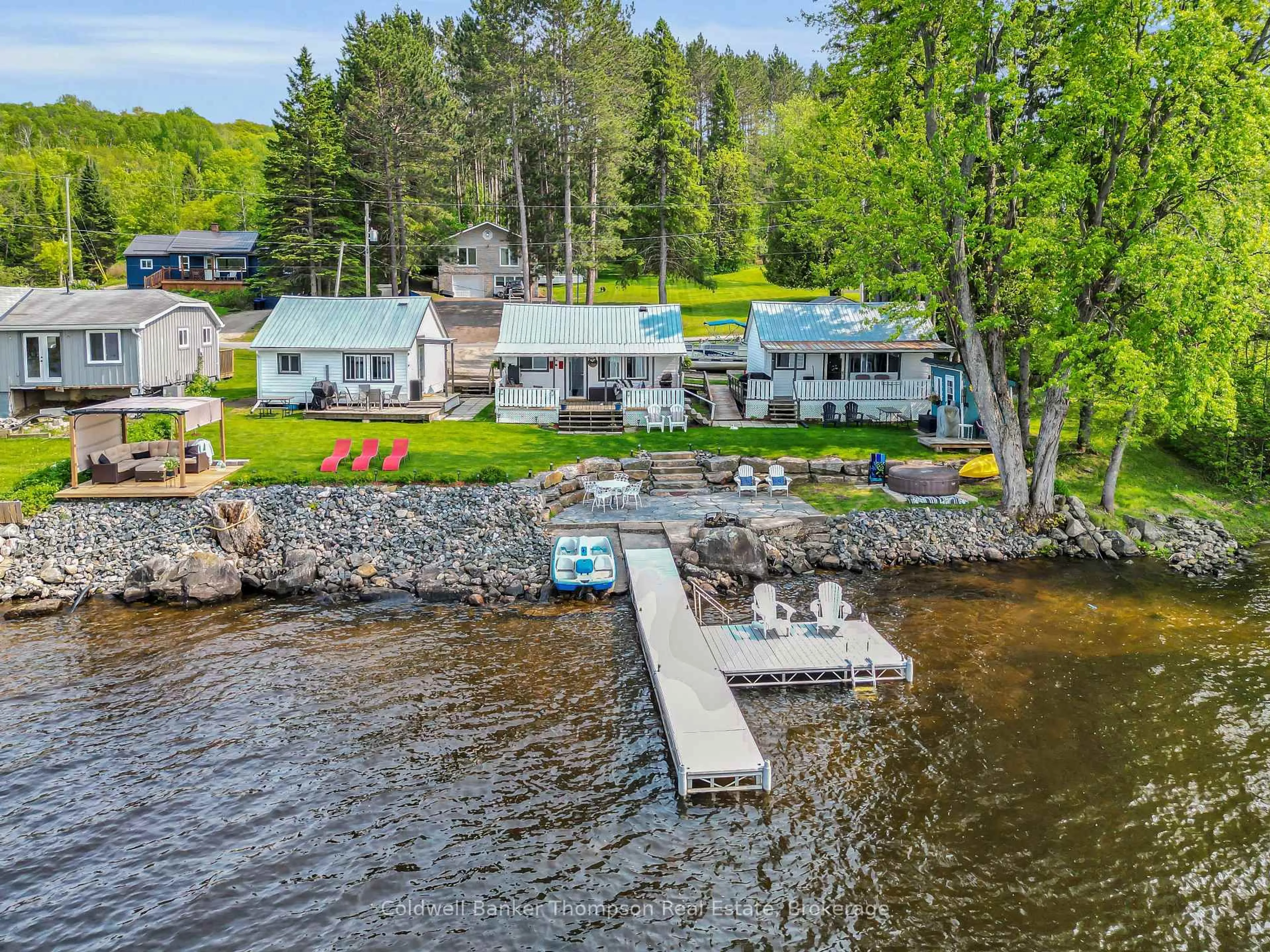 A pic from outside/outdoor area/front of a property/back of a property/a pic from drone, water/lake/river/ocean view for 312 Doe Lake Rd, Armour Ontario P0A 1L0
