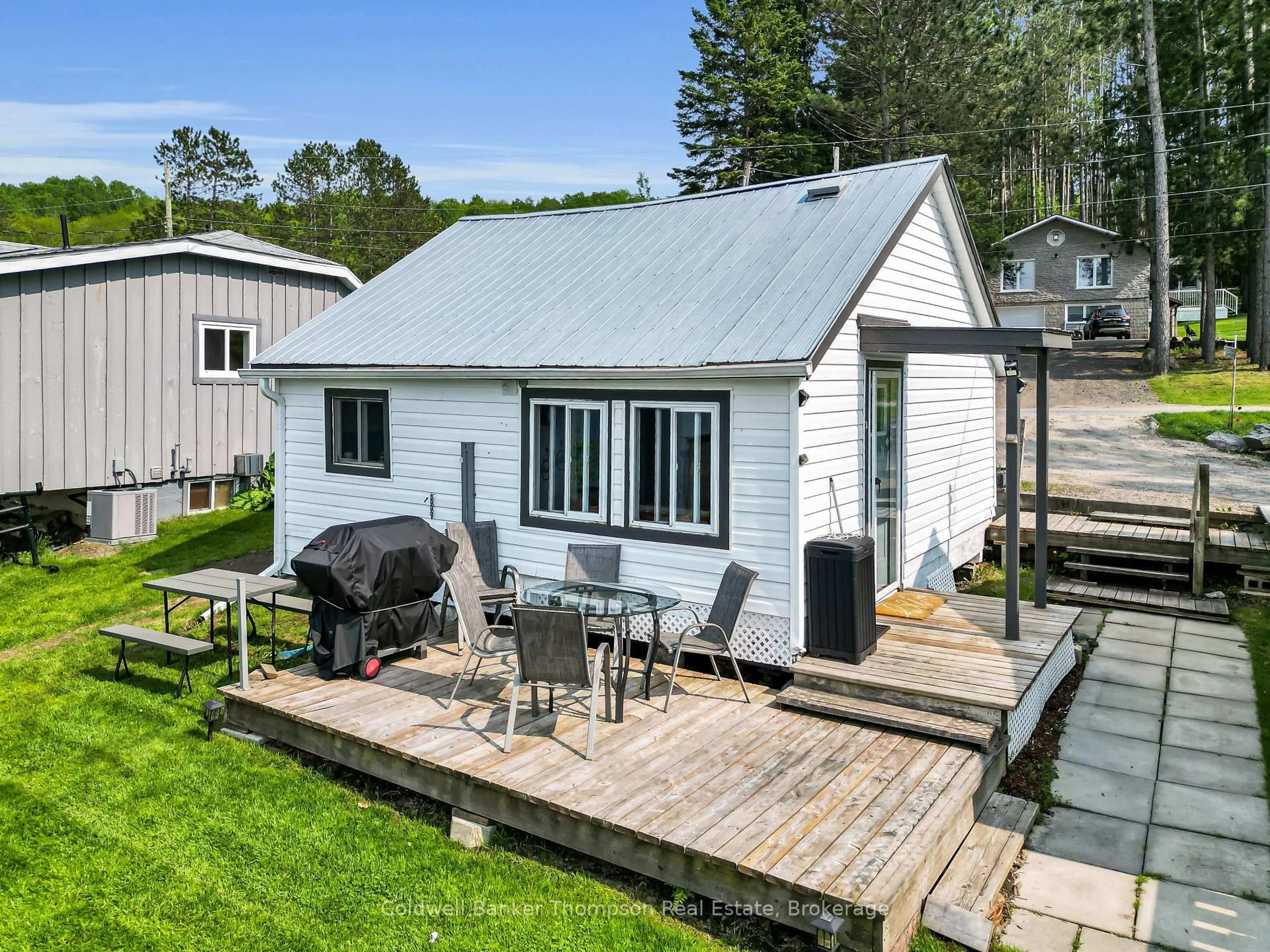 A pic from outside/outdoor area/front of a property/back of a property/a pic from drone, street for 312 Doe Lake Rd, Armour Ontario P0A 1L0