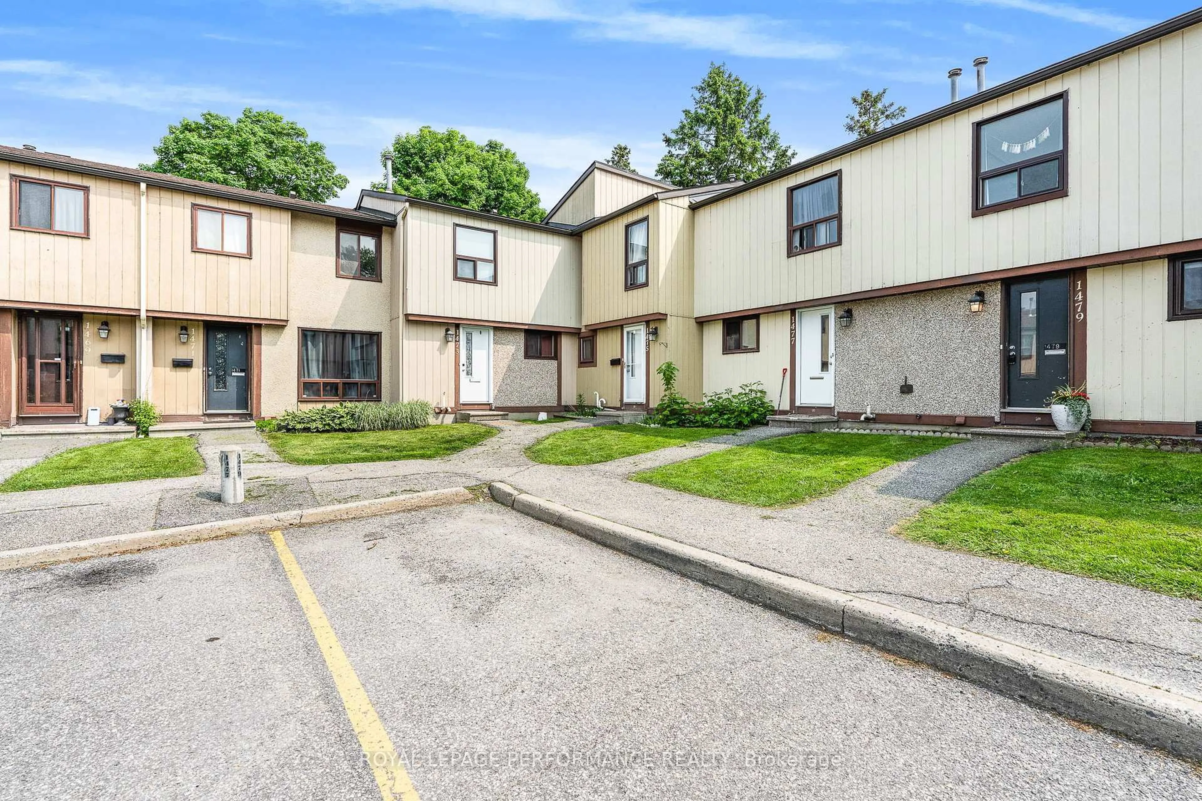 A pic from outside/outdoor area/front of a property/back of a property/a pic from drone, street for 1479 Bethamy Lane #7, Ottawa Ontario K1J 8P7