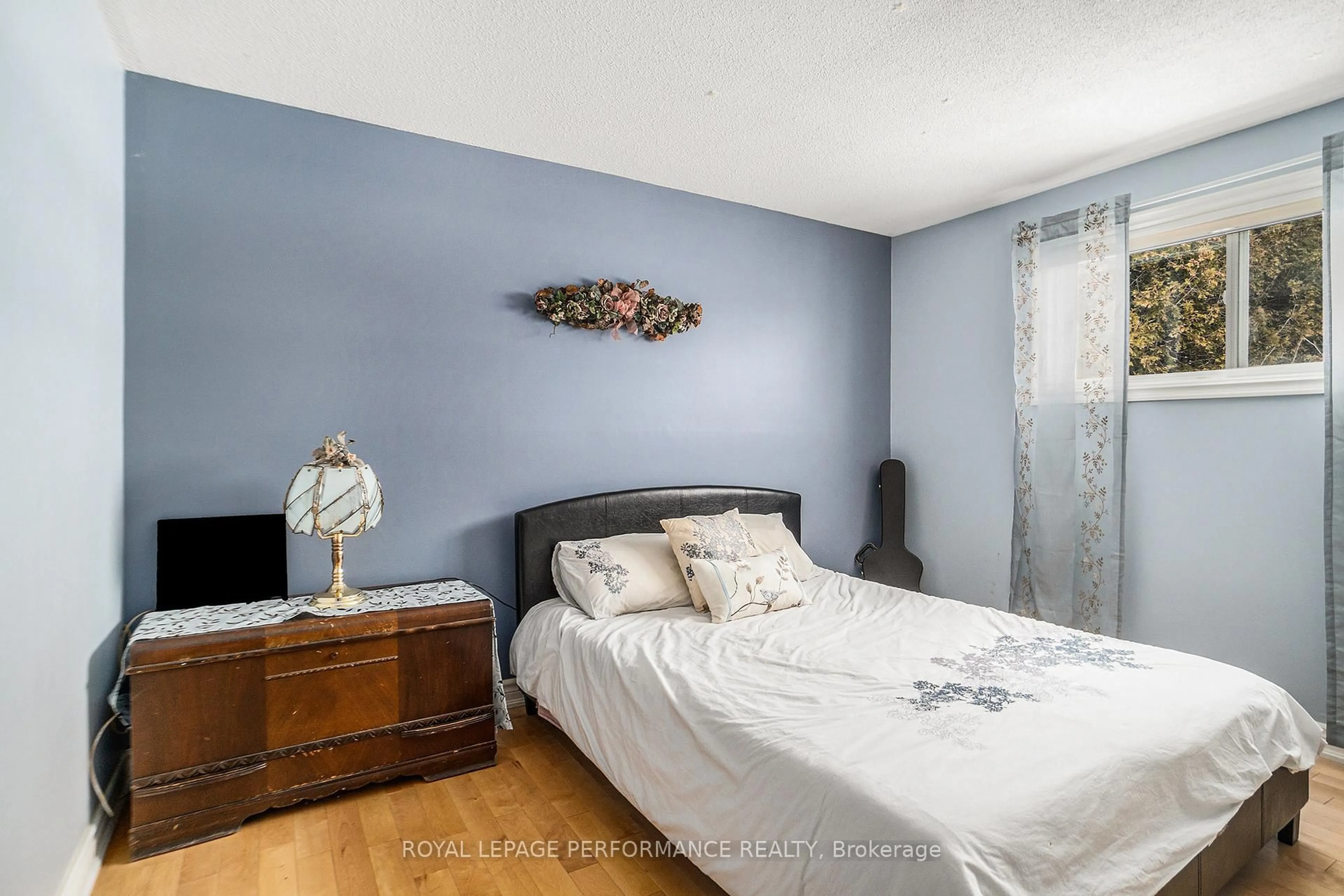 Bedroom with bed, wood/laminate floor for 1430 Notre Dame St, Russell Ontario K0A 1W0