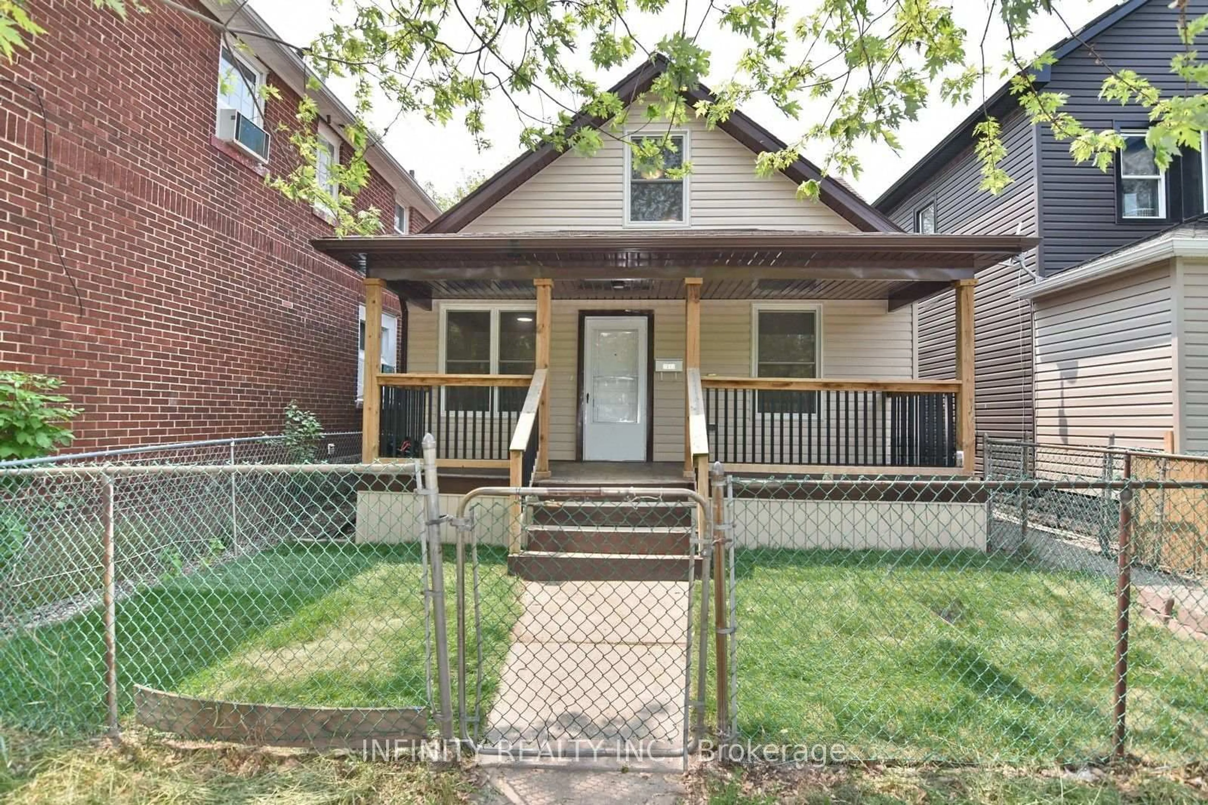 Home with brick exterior material, street for 1017 Henry Ford Centre Dr, Windsor Ontario N8Y 2T4