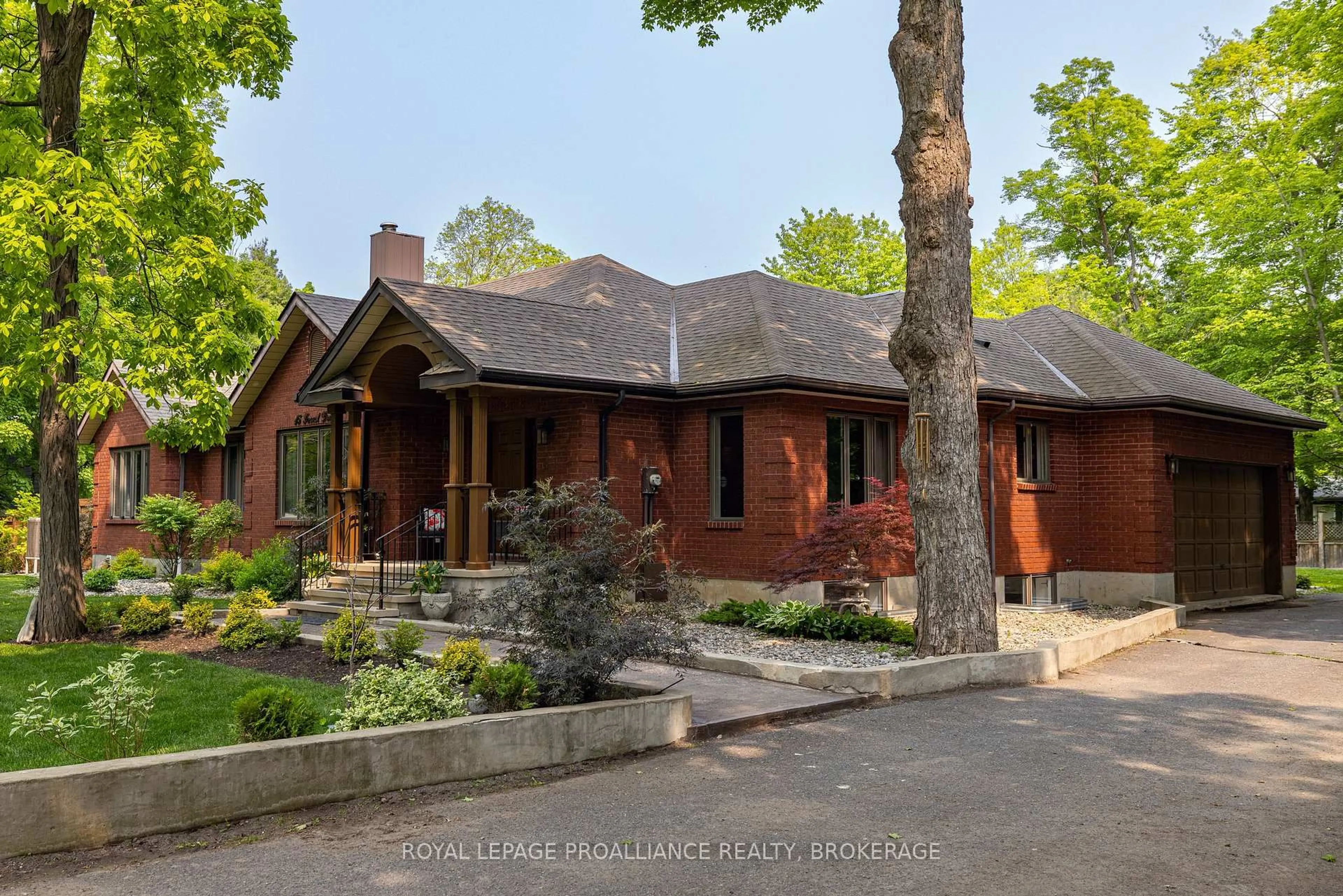 Home with brick exterior material, street for 15 Forest Dr, Kingston Ontario K7L 4V1