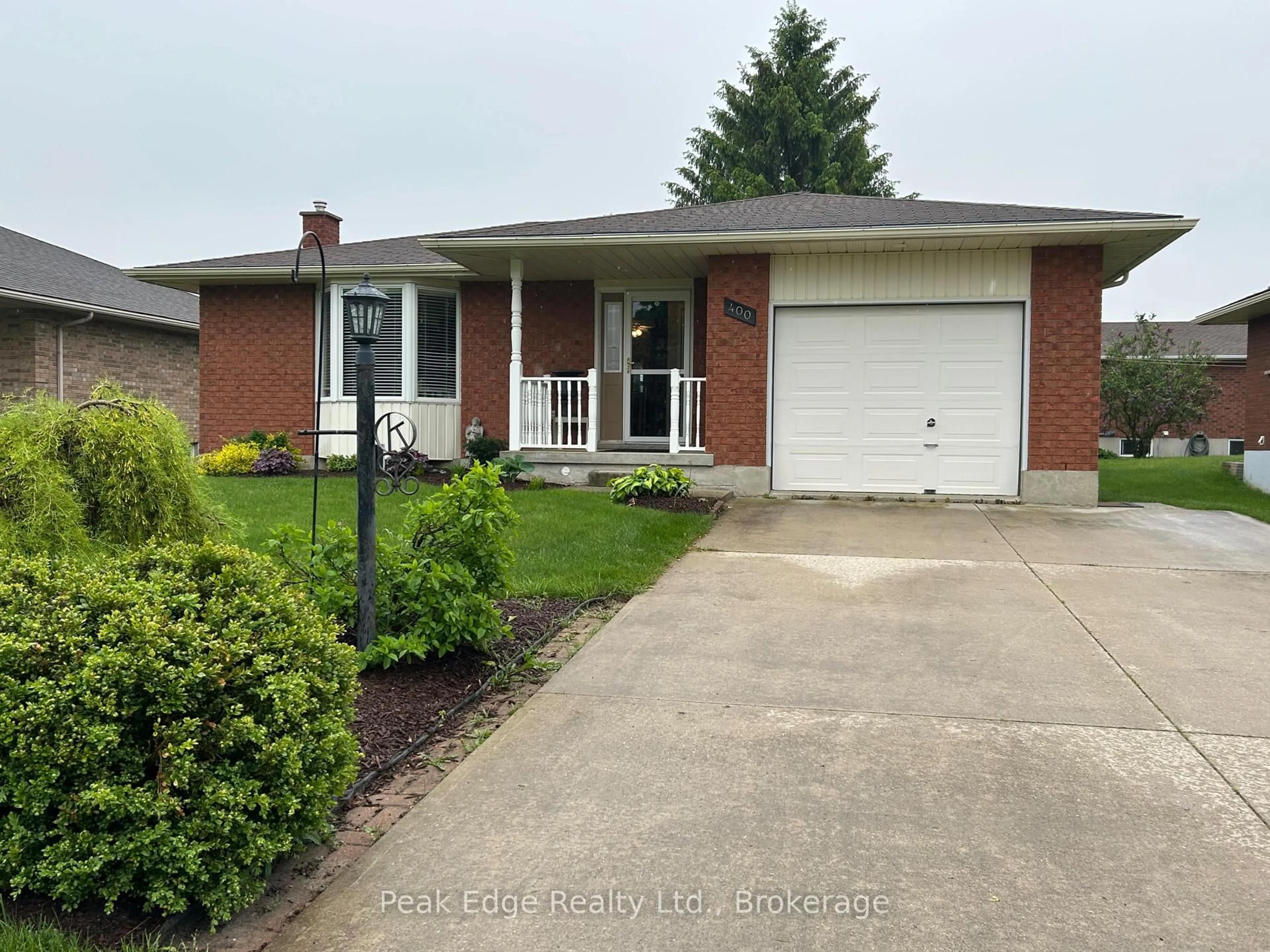 Home with brick exterior material, street for 400 Durham St, Wellington North Ontario N0G 2L2