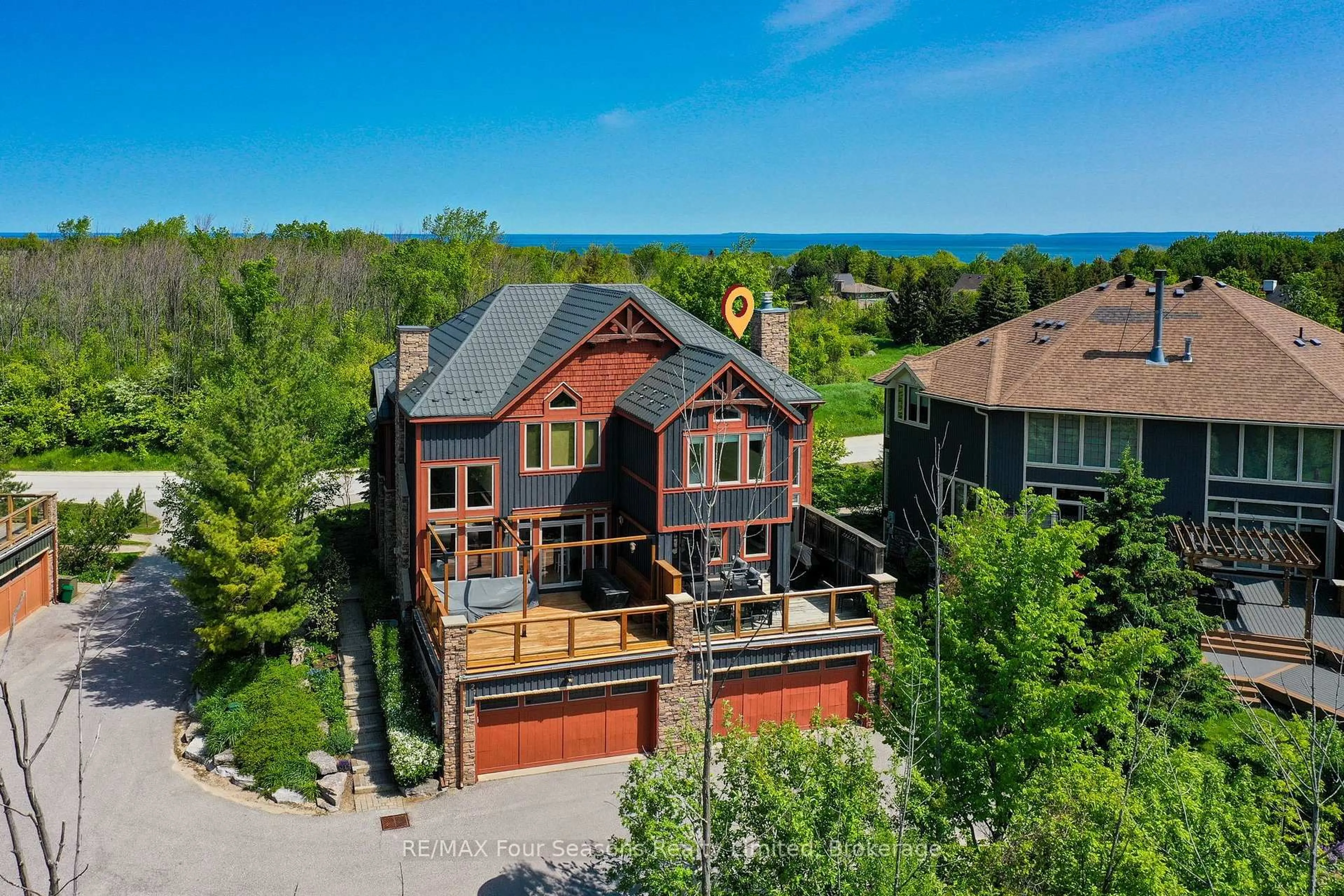 A pic from outside/outdoor area/front of a property/back of a property/a pic from drone, water/lake/river/ocean view for 214 BLUESKI GEORGE Cres #26, Blue Mountains Ontario L9Y 0V5