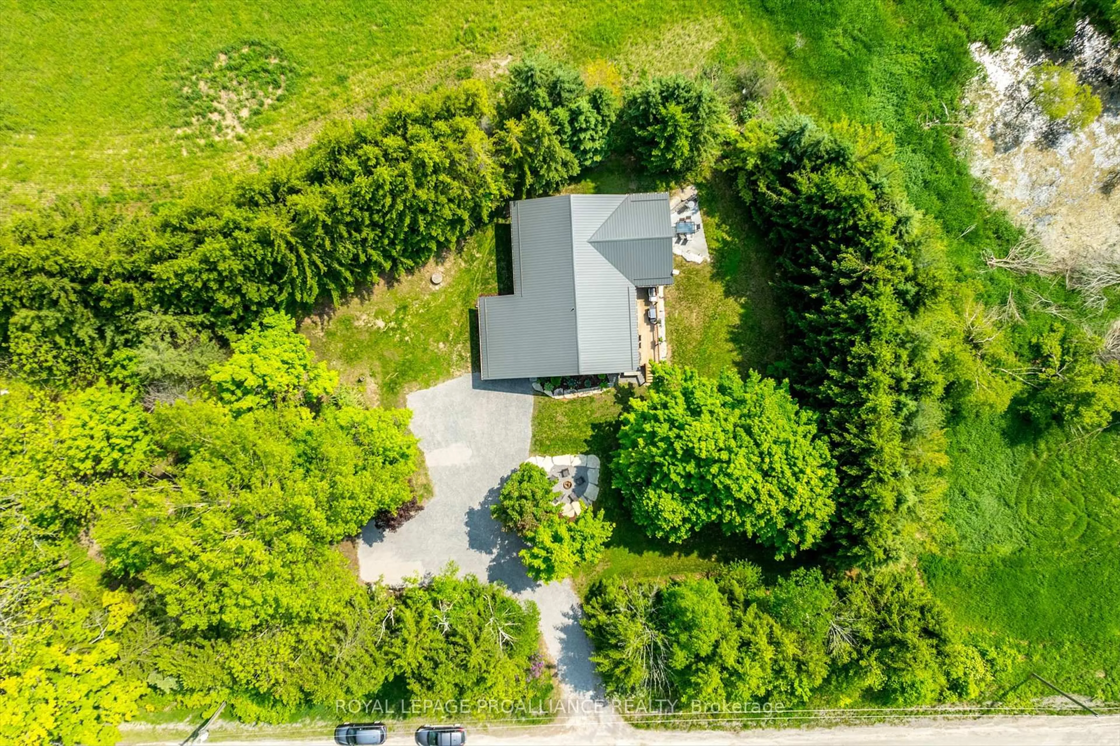 A pic from outside/outdoor area/front of a property/back of a property/a pic from drone, street for 4045 Bowman Rd, Hamilton Township Ontario K9A 4J9