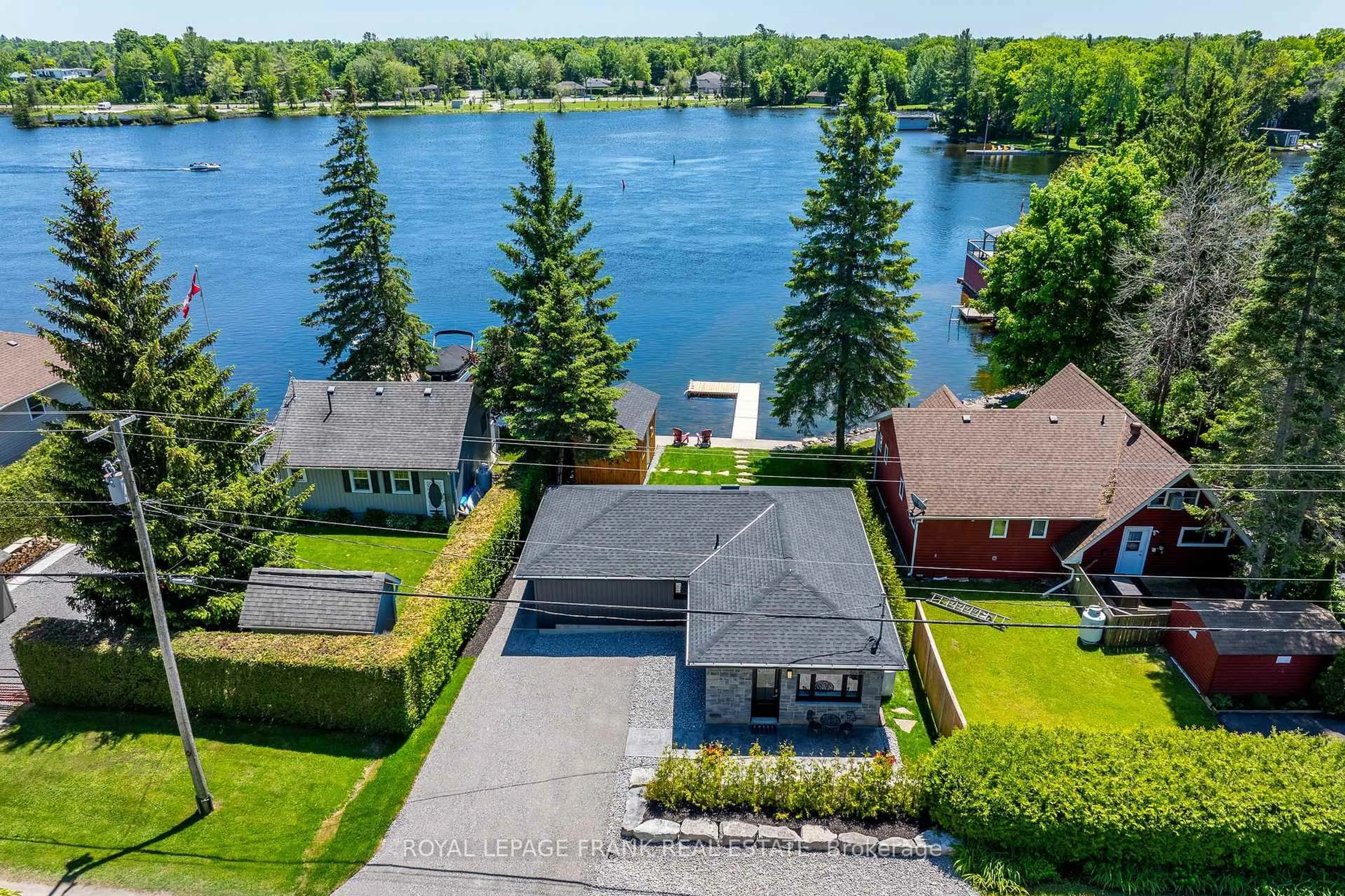 A pic from outside/outdoor area/front of a property/back of a property/a pic from drone, water/lake/river/ocean view for 178 Front St, Kawartha Lakes Ontario K0M 1A0