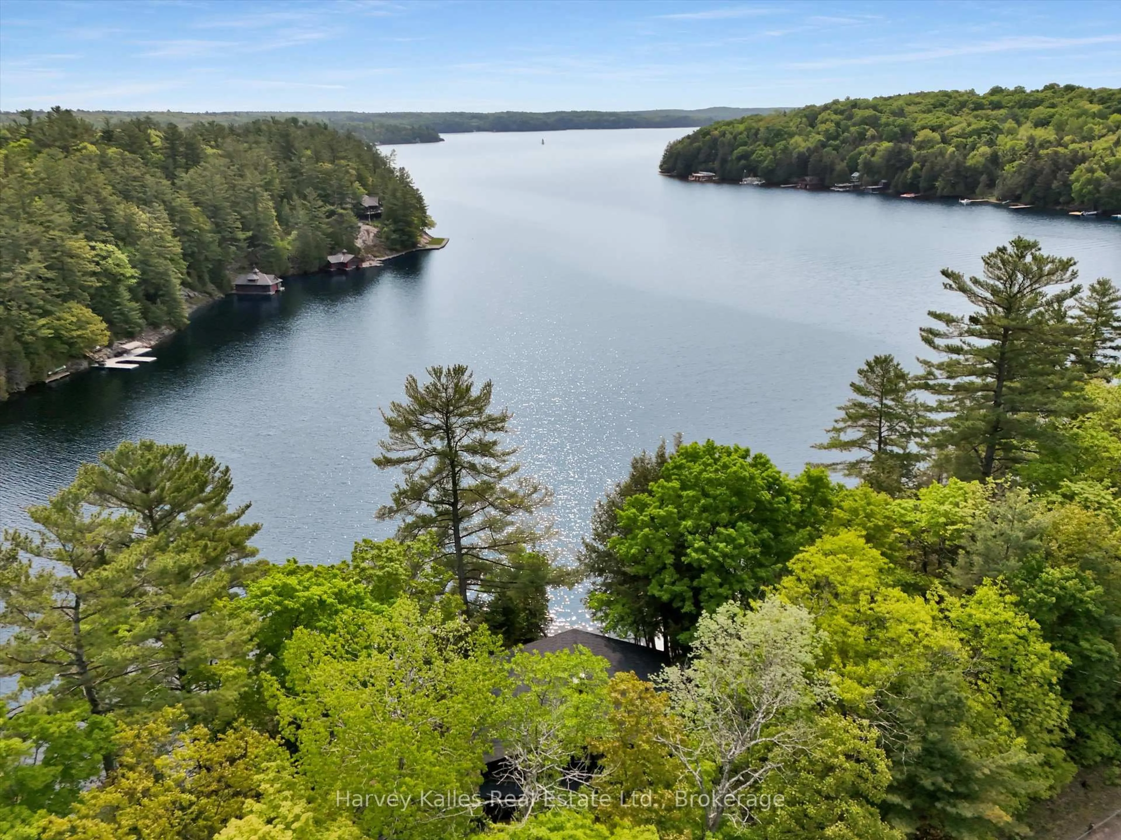 A pic from outside/outdoor area/front of a property/back of a property/a pic from drone, water/lake/river/ocean view for 155 Highway 632 Highway, Seguin Ontario P0C 1J0