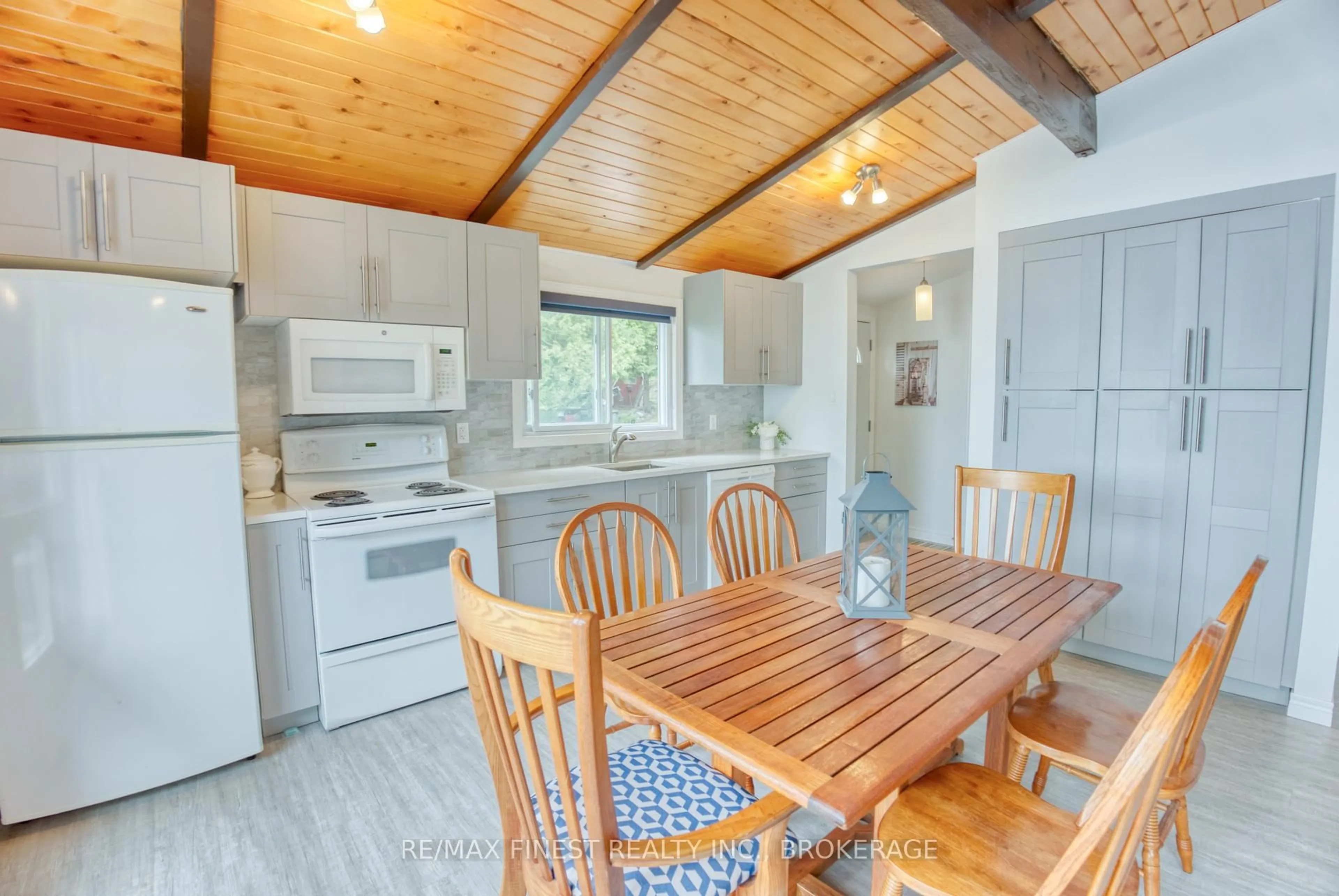 Open concept kitchen, wood/laminate floor for 1026B West Shore Lane, Parham Ontario K0H 2K0