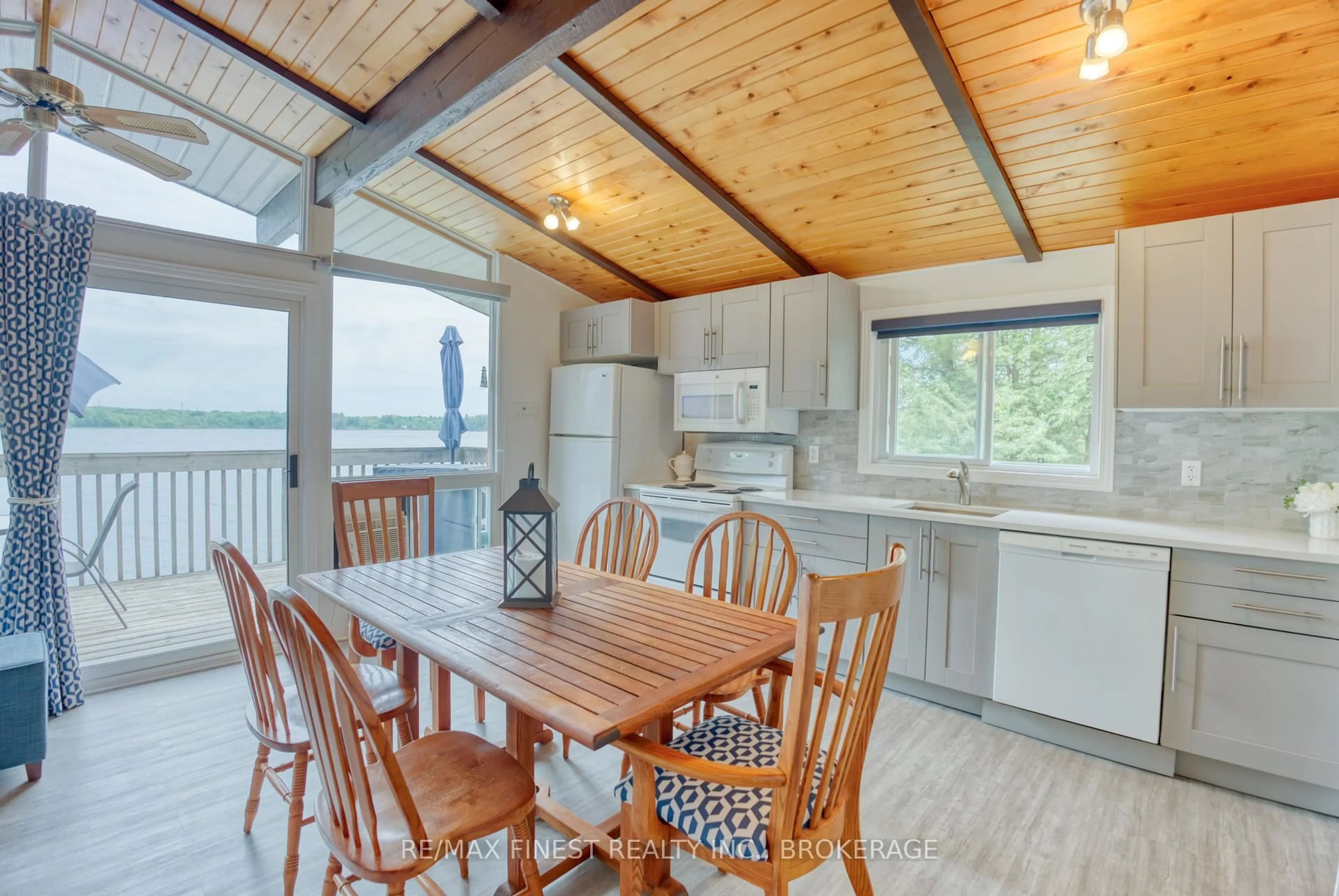 Open concept kitchen, wood/laminate floor for 1026B West Shore Lane, Parham Ontario K0H 2K0
