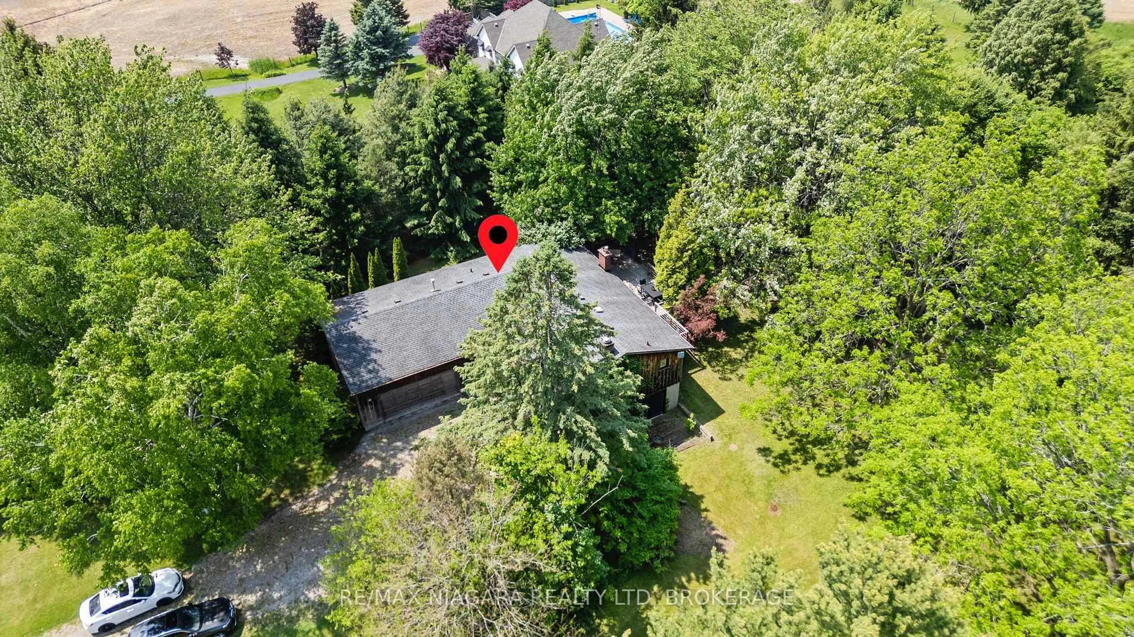A pic from outside/outdoor area/front of a property/back of a property/a pic from drone, forest/trees view for 705 Metler Rd, Pelham Ontario L0S 1C0