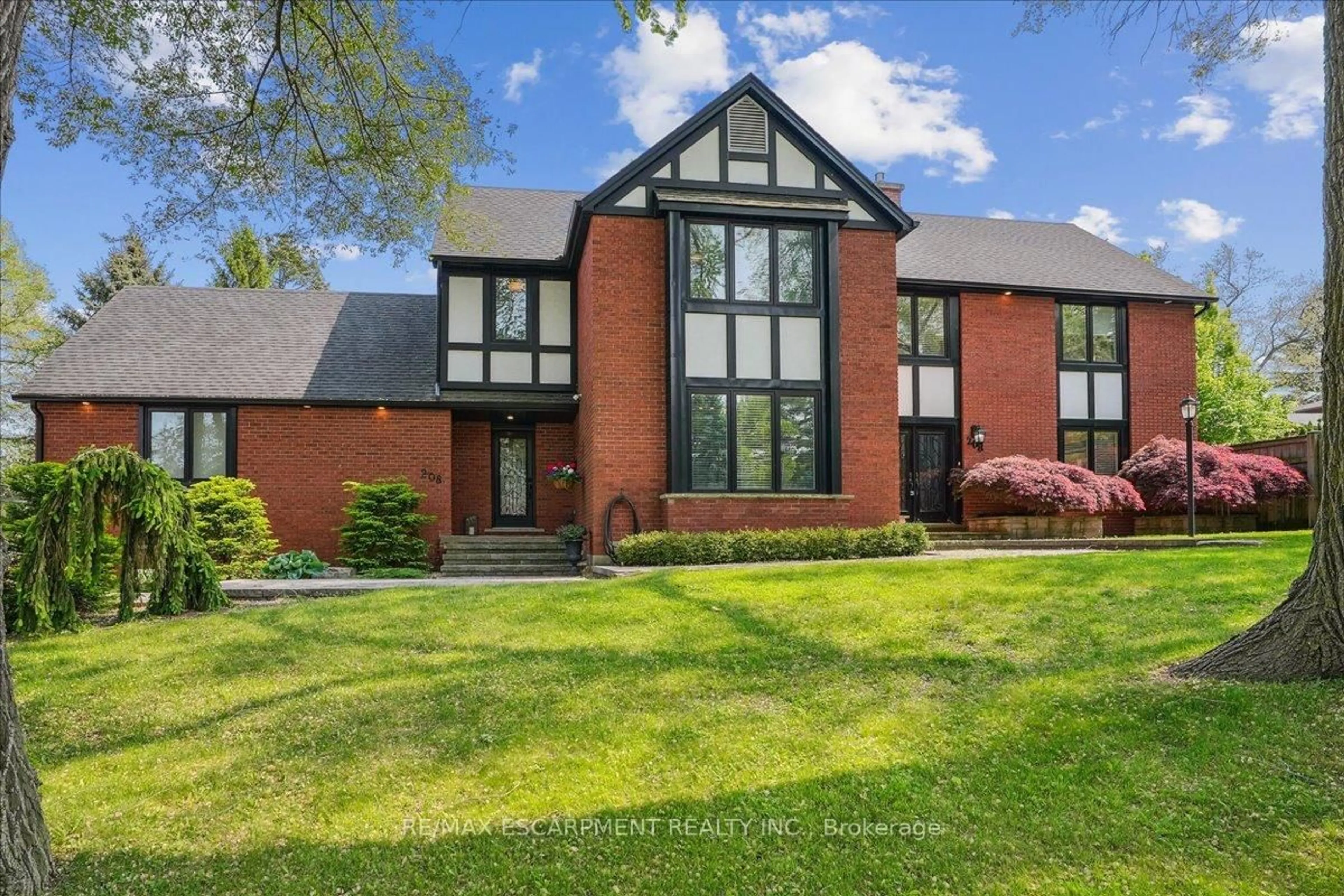 Home with brick exterior material, unknown for 208 Mohawk Rd, Hamilton Ontario L9G 2W9