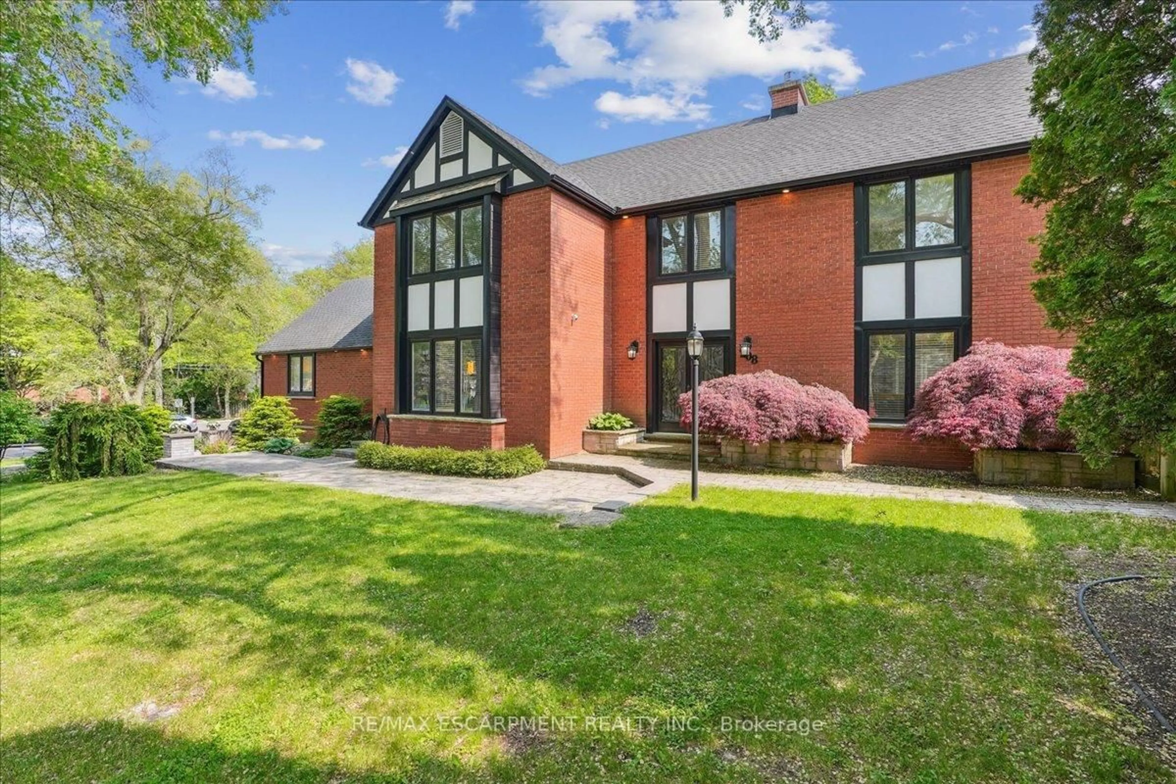 Home with brick exterior material, street for 208 Mohawk Rd, Hamilton Ontario L9G 2W9