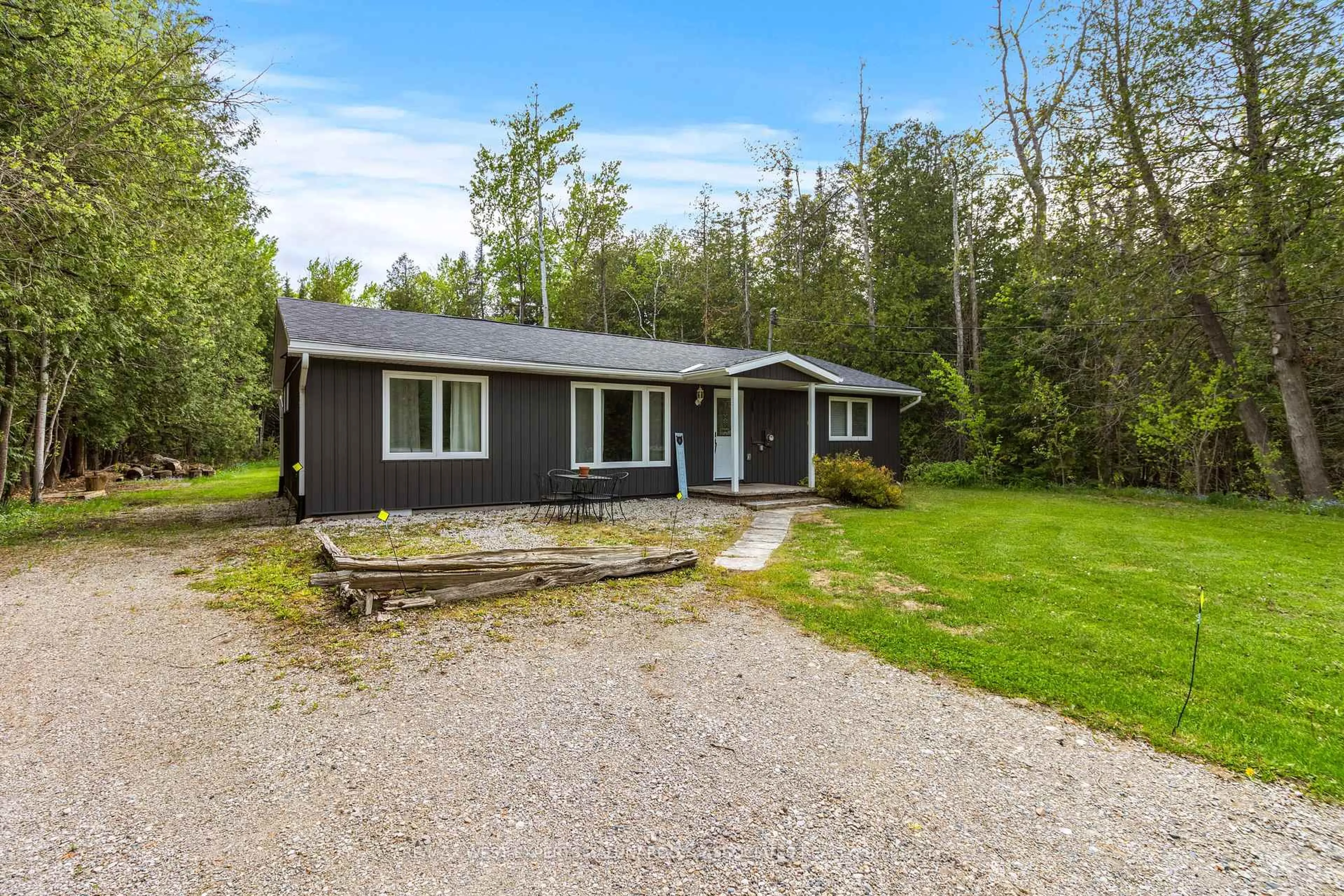 A pic from outside/outdoor area/front of a property/back of a property/a pic from drone, street for 7221 Highway 6 Rd, Northern Bruce Peninsula Ontario N0H 2T0