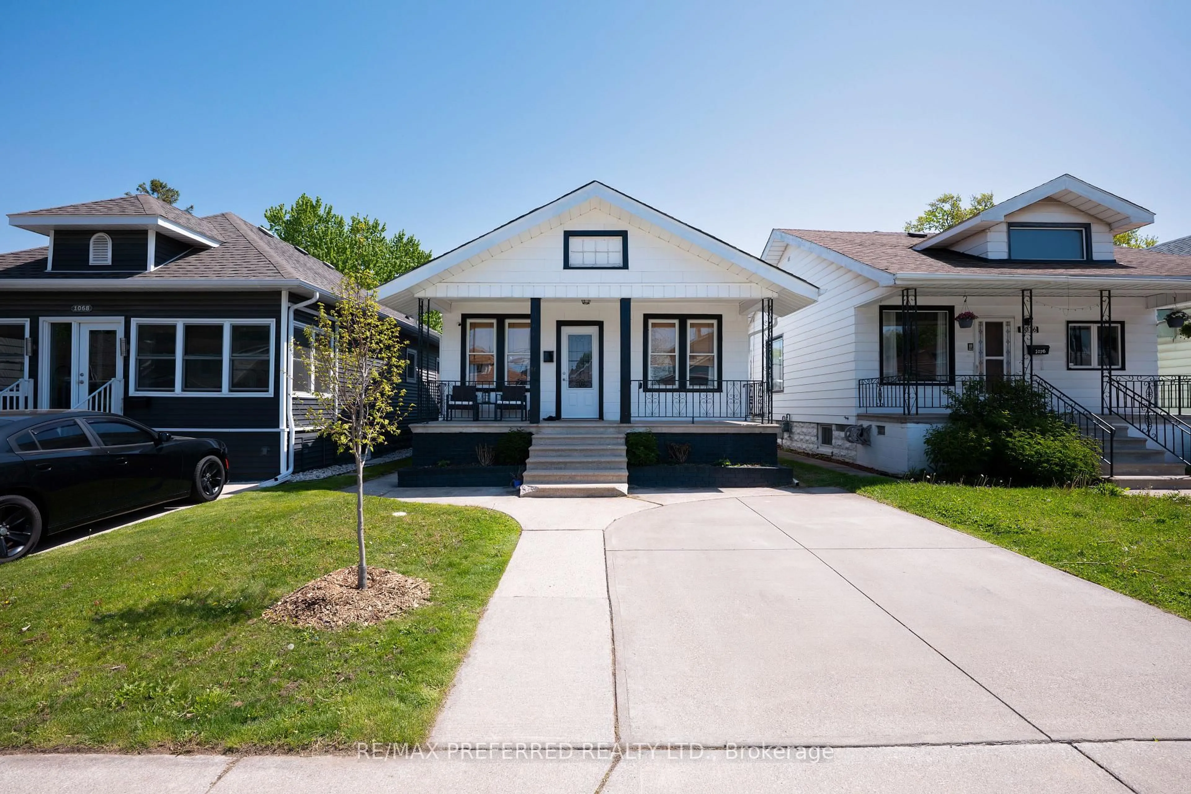 Home with vinyl exterior material, street for 1072 Elm Ave, Windsor Ontario N9A 5H7