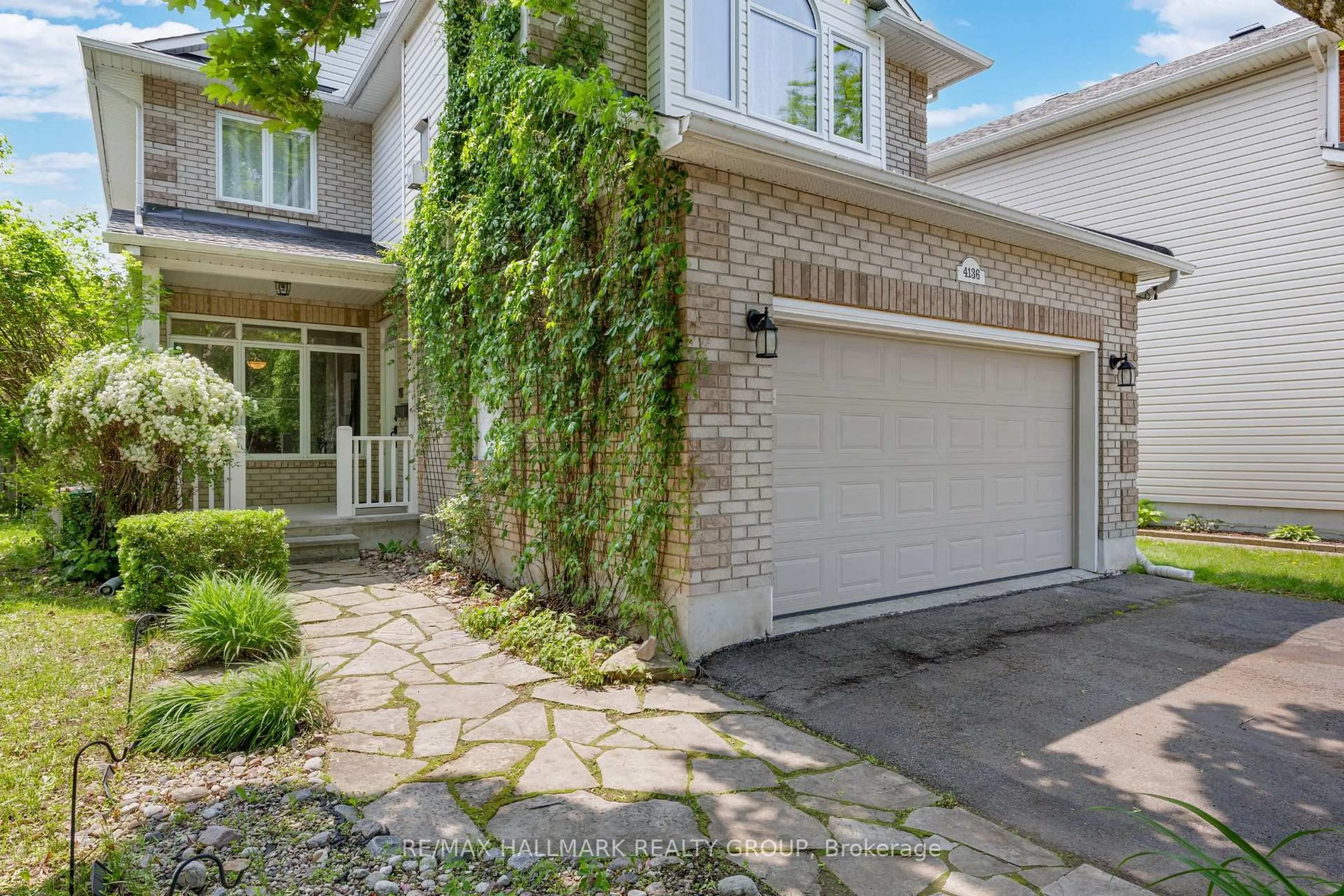 Home with brick exterior material, street for 4136 Wolfe Point Way, Ottawa Ontario K1V 1P4