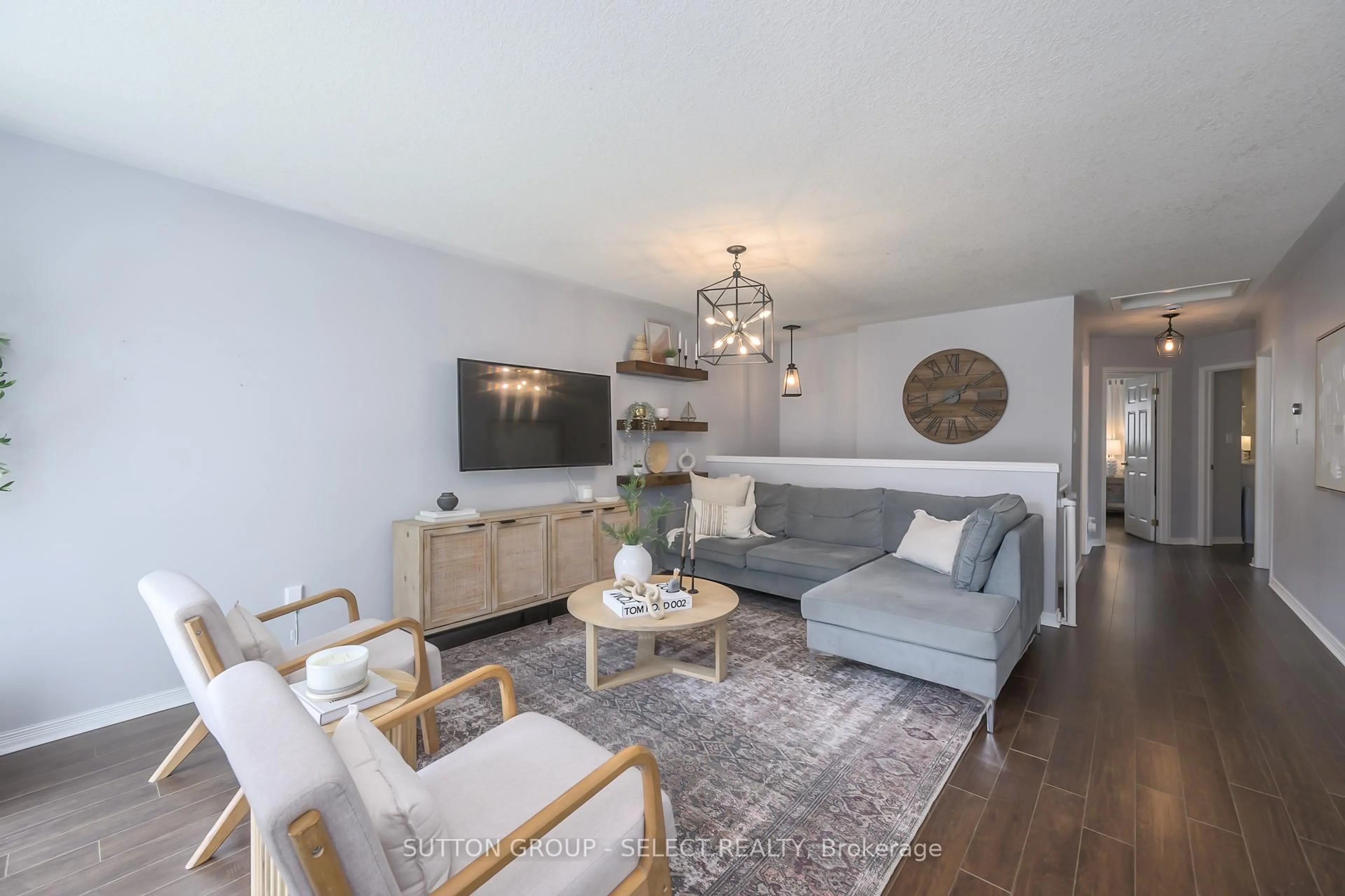 Living room with furniture, wood/laminate floor for 1868 Purcell Dr, London East Ontario N5W 6E3