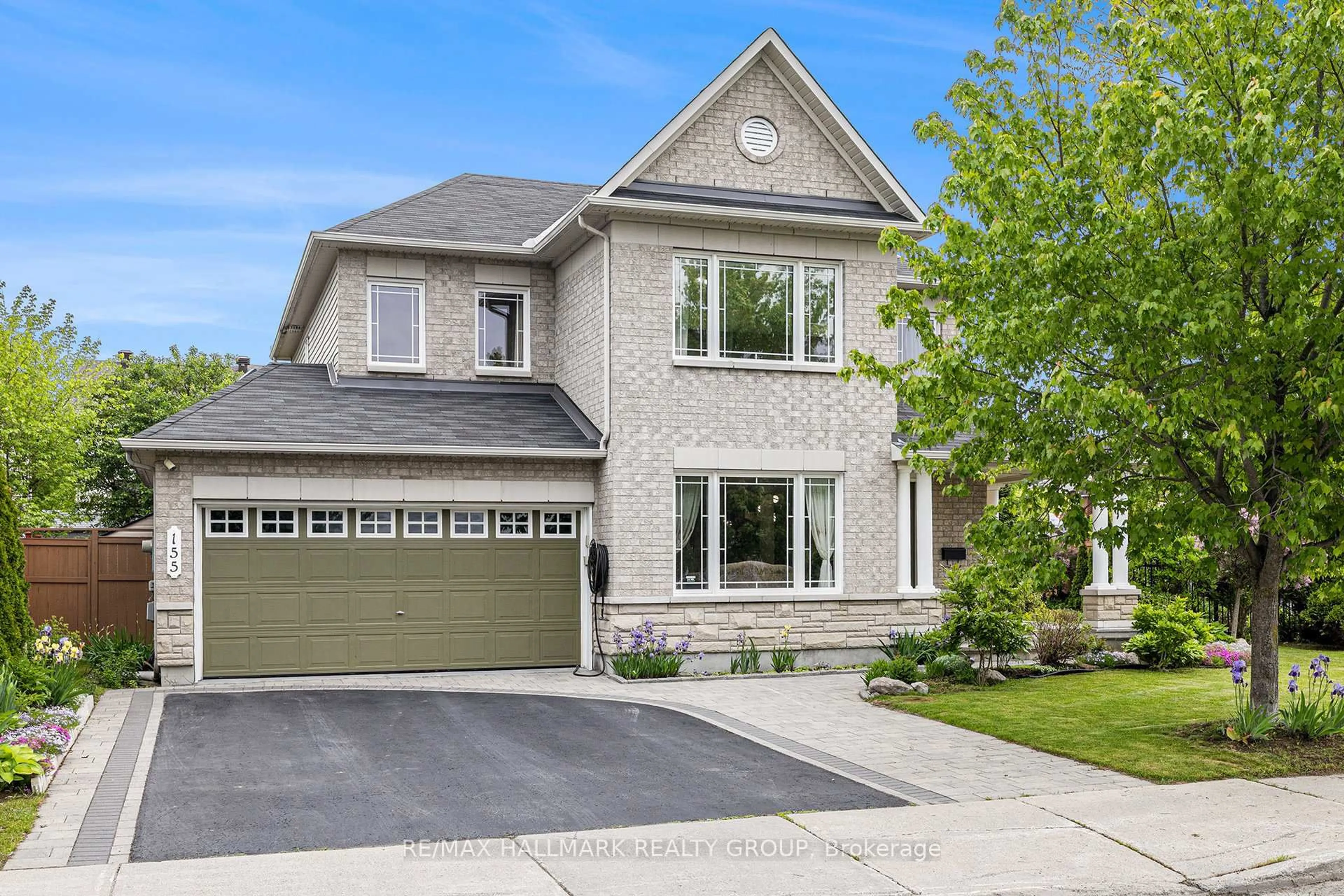 Home with brick exterior material, street for 155 Tapestry Dr, Ottawa Ontario K2J 0H4
