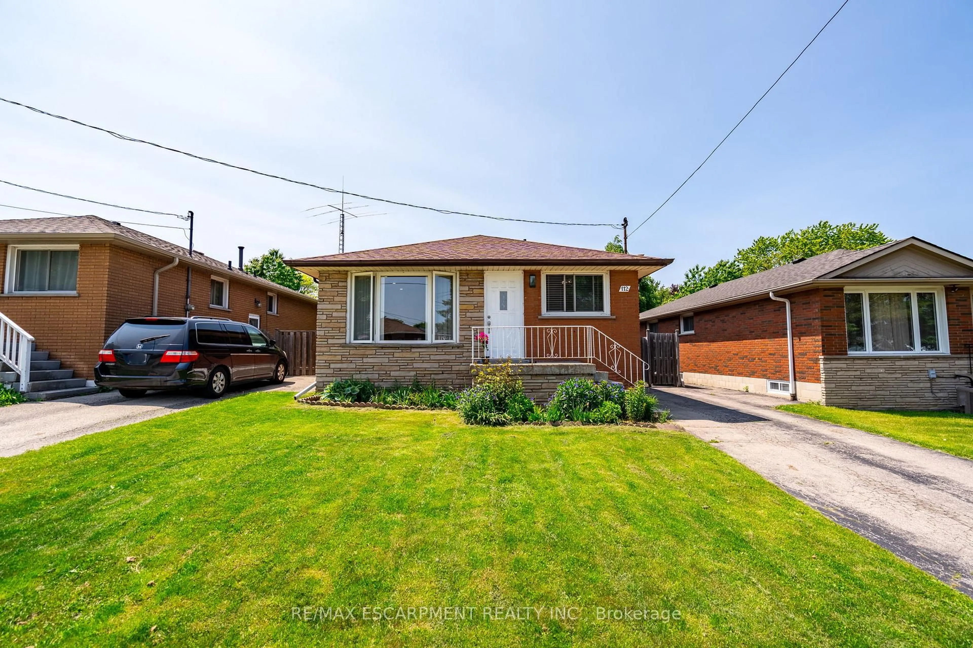 Home with brick exterior material, street for 112 GREENINGDON Dr, Hamilton Ontario L9A 4W7