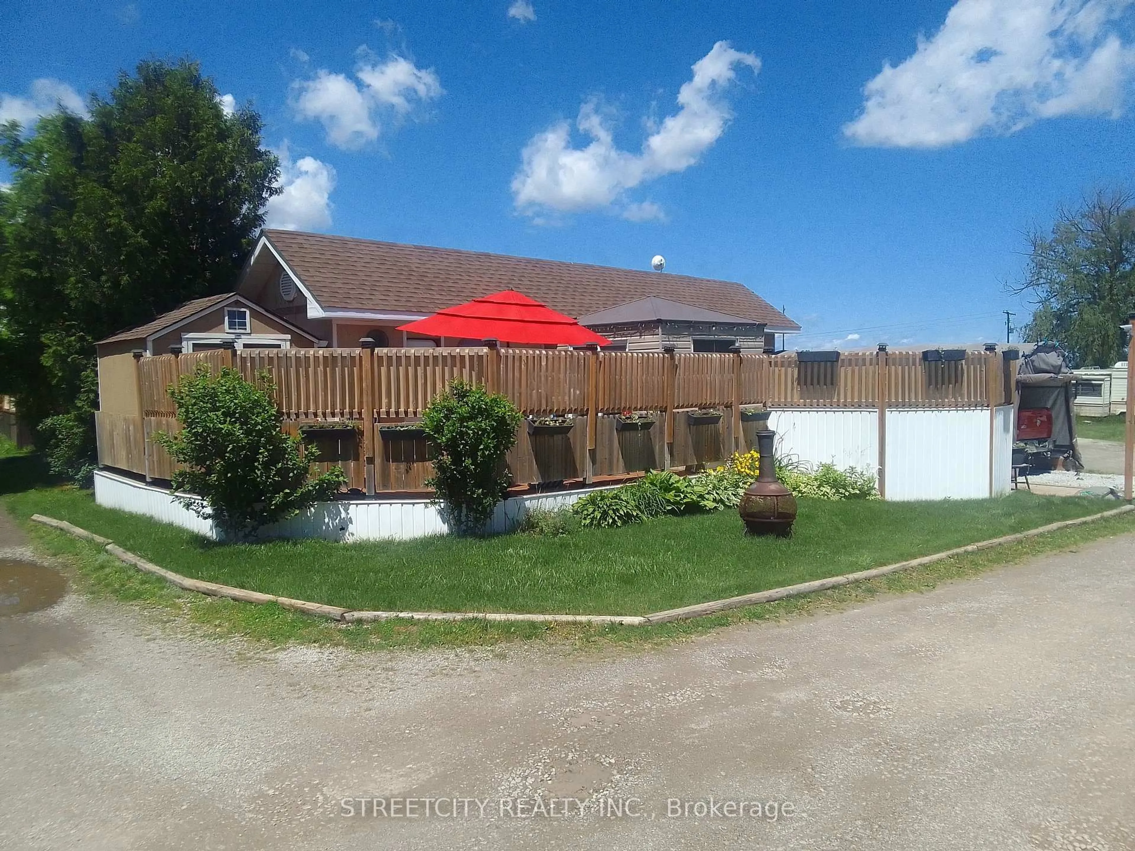 A pic from outside/outdoor area/front of a property/back of a property/a pic from drone, unknown for 4351 London Line #1, Plympton-Wyoming Ontario N0N 1T0