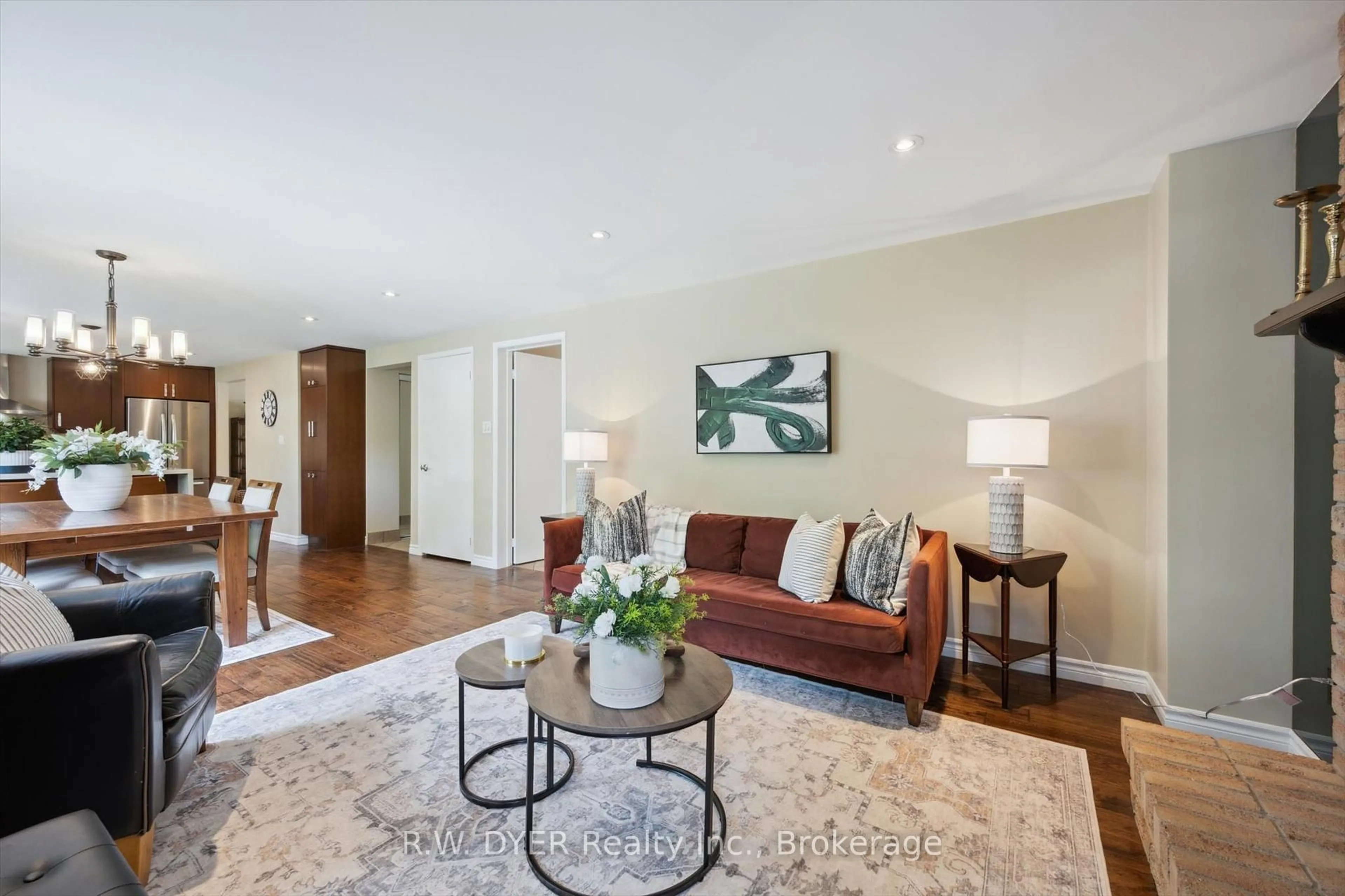 Living room with furniture, wood/laminate floor for 67 Rose Bridge Cres, Cambridge Ontario N3C 3Z2