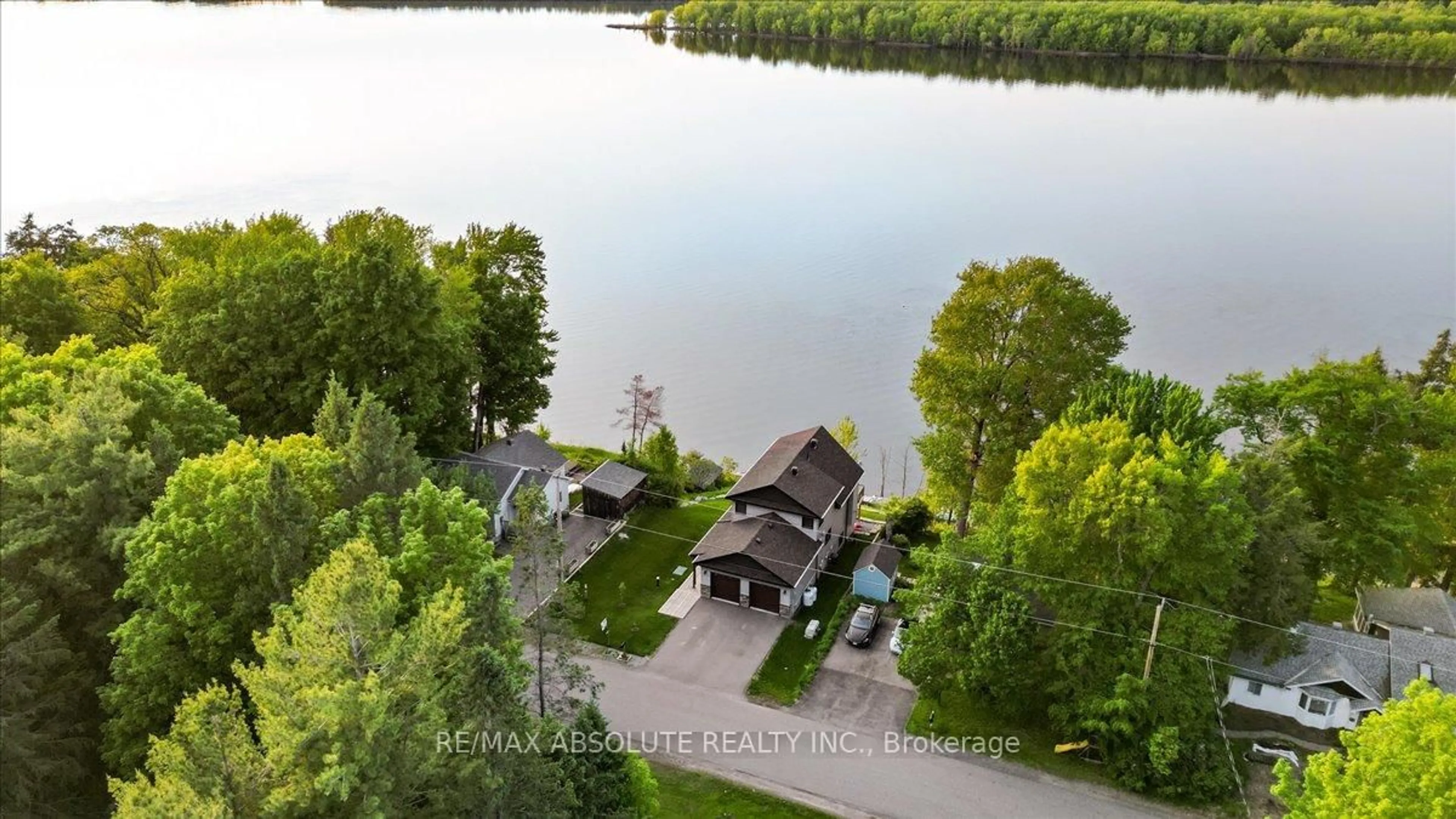 A pic from outside/outdoor area/front of a property/back of a property/a pic from drone, water/lake/river/ocean view for 304 Riverwood Dr, Ottawa Ontario K0A 3M0