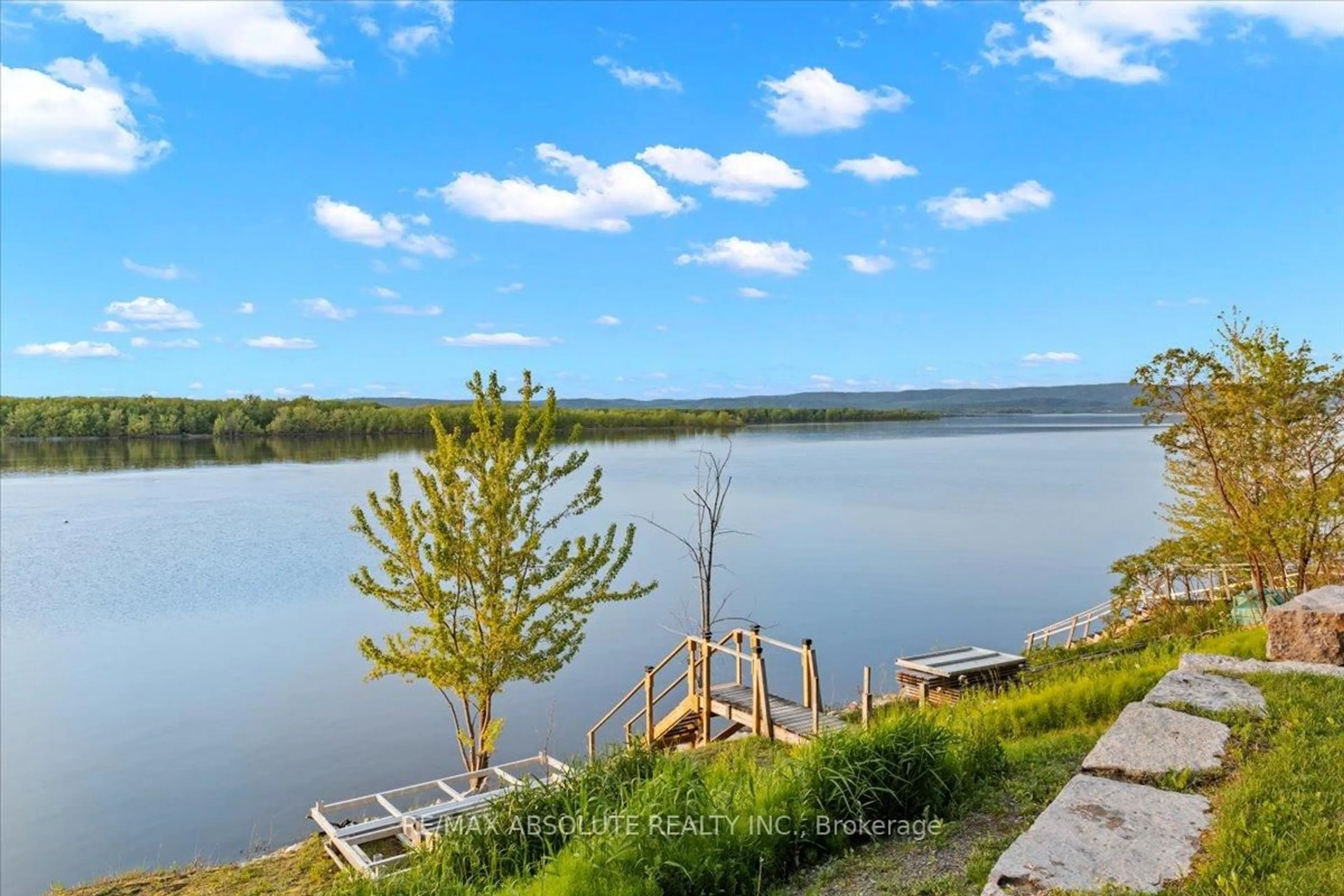 A pic from outside/outdoor area/front of a property/back of a property/a pic from drone, water/lake/river/ocean view for 304 Riverwood Dr, Ottawa Ontario K0A 3M0