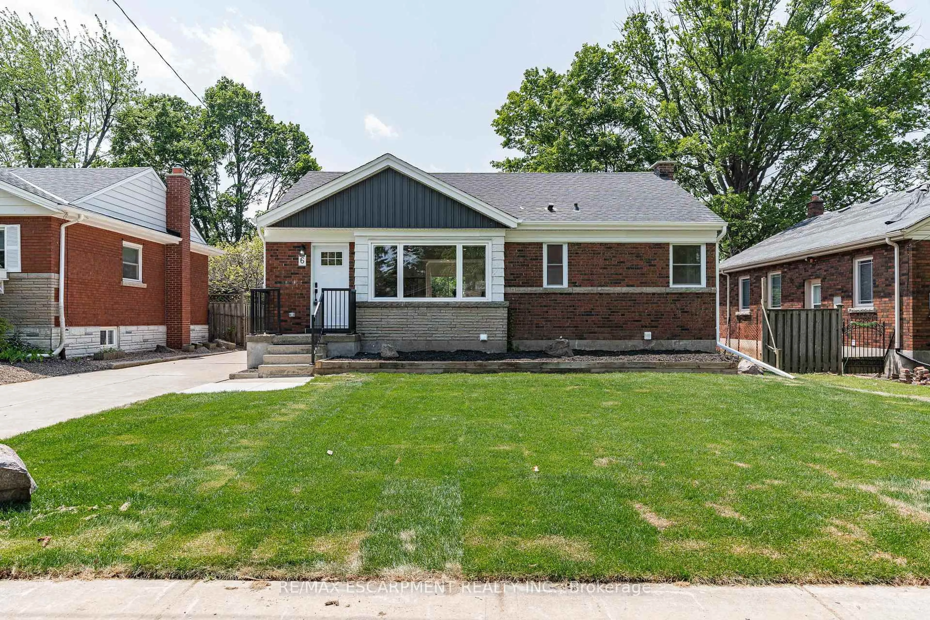 Home with brick exterior material, street for 6 Mulock Ave, Hamilton Ontario L8T 1H3