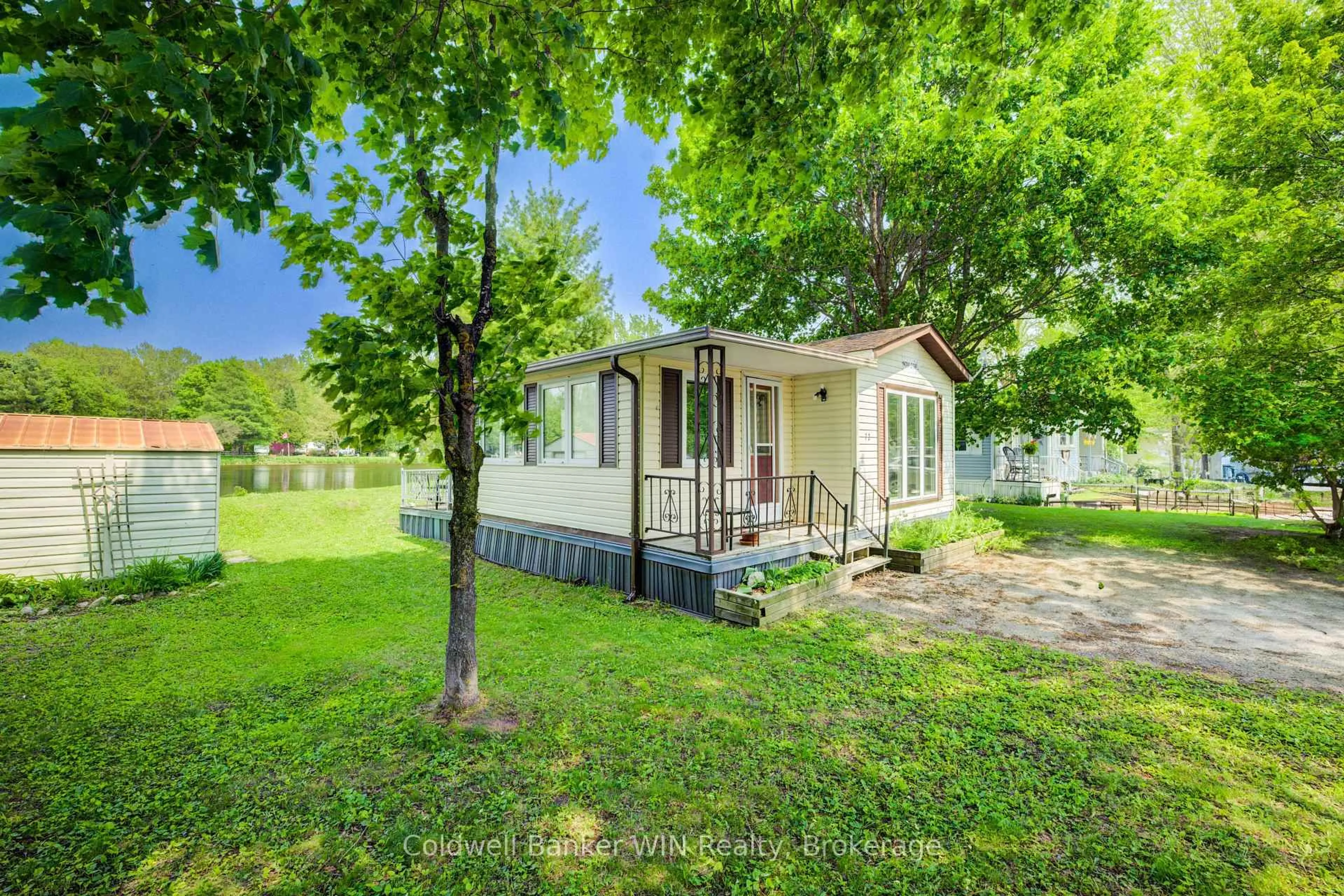 Home with vinyl exterior material, street for 72 LAKESIDE, 7489 Side Road 5 E, Wellington North Ontario N0G 2L0