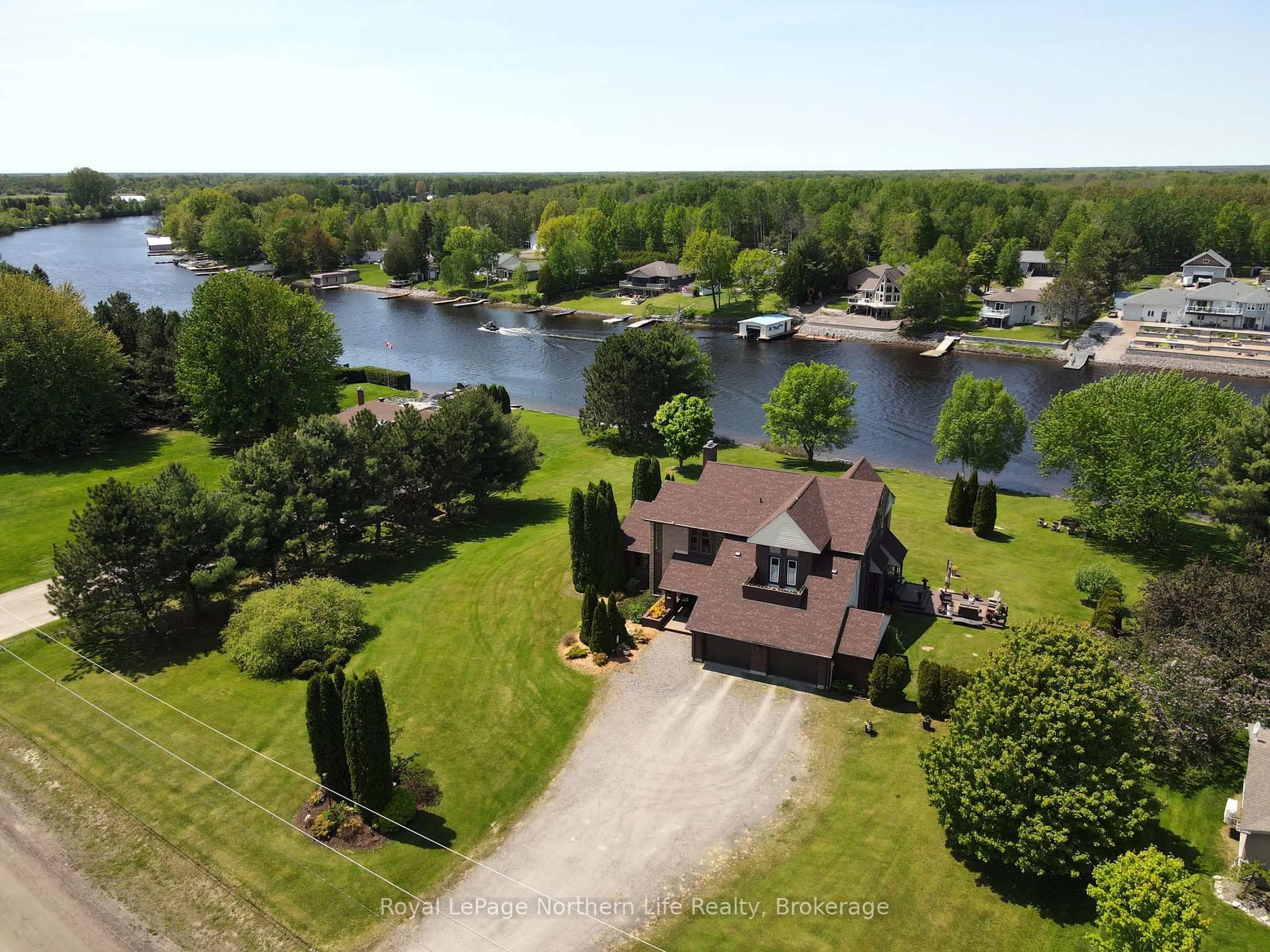 A pic from outside/outdoor area/front of a property/back of a property/a pic from drone, water/lake/river/ocean view for 451 Champagne Rd, West Nipissing Ontario P2B 2L9