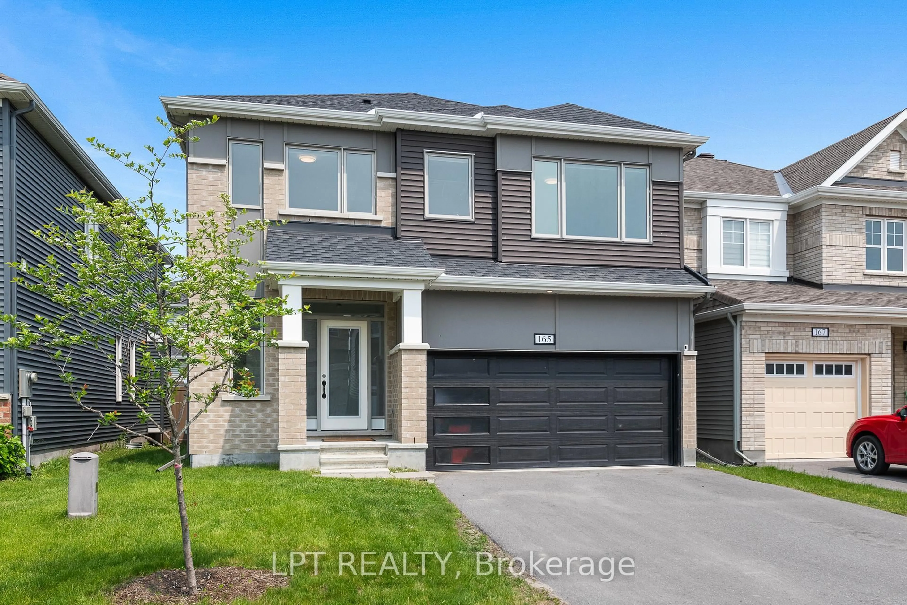 Home with brick exterior material, street for 165 Celestial Grve, Ottawa Ontario K2J 6R6