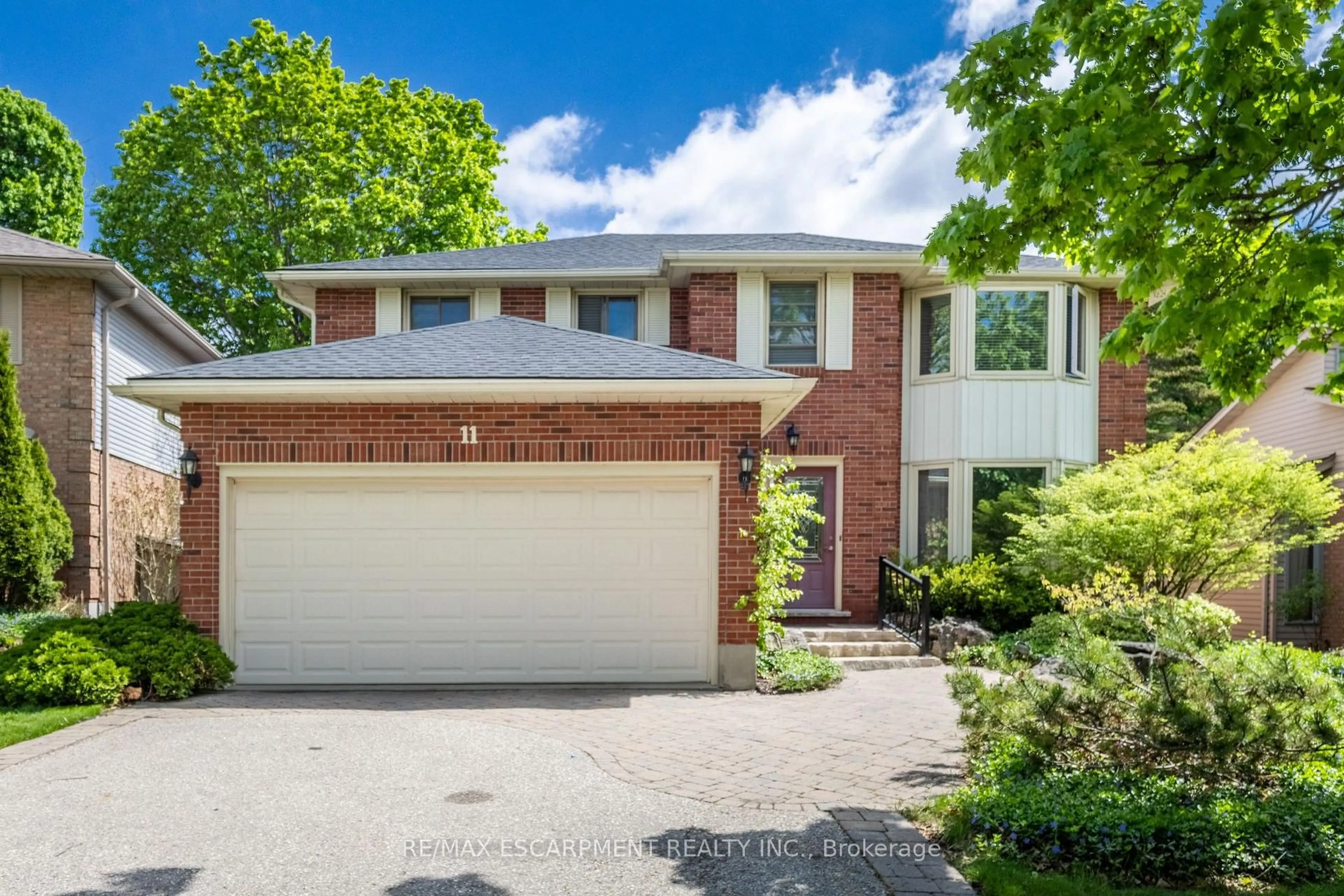 Home with brick exterior material, street for 11 Bridlewood Dr, Guelph Ontario N1G 4A5