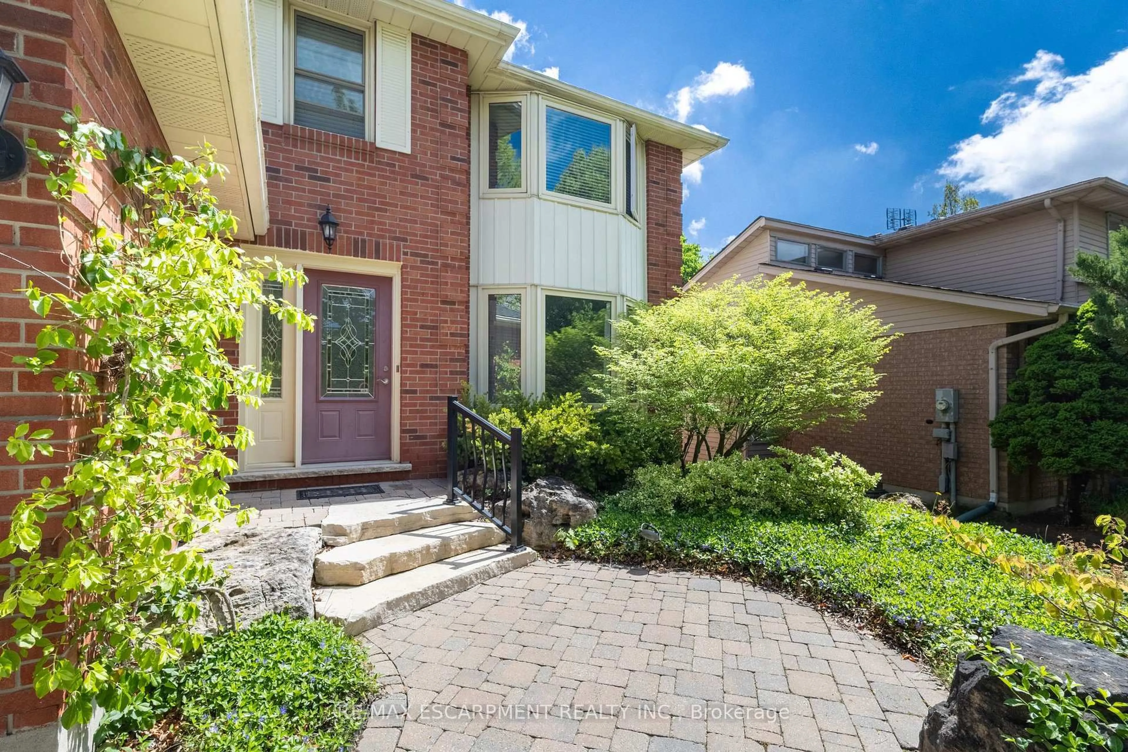 Home with brick exterior material, street for 11 Bridlewood Dr, Guelph Ontario N1G 4A5