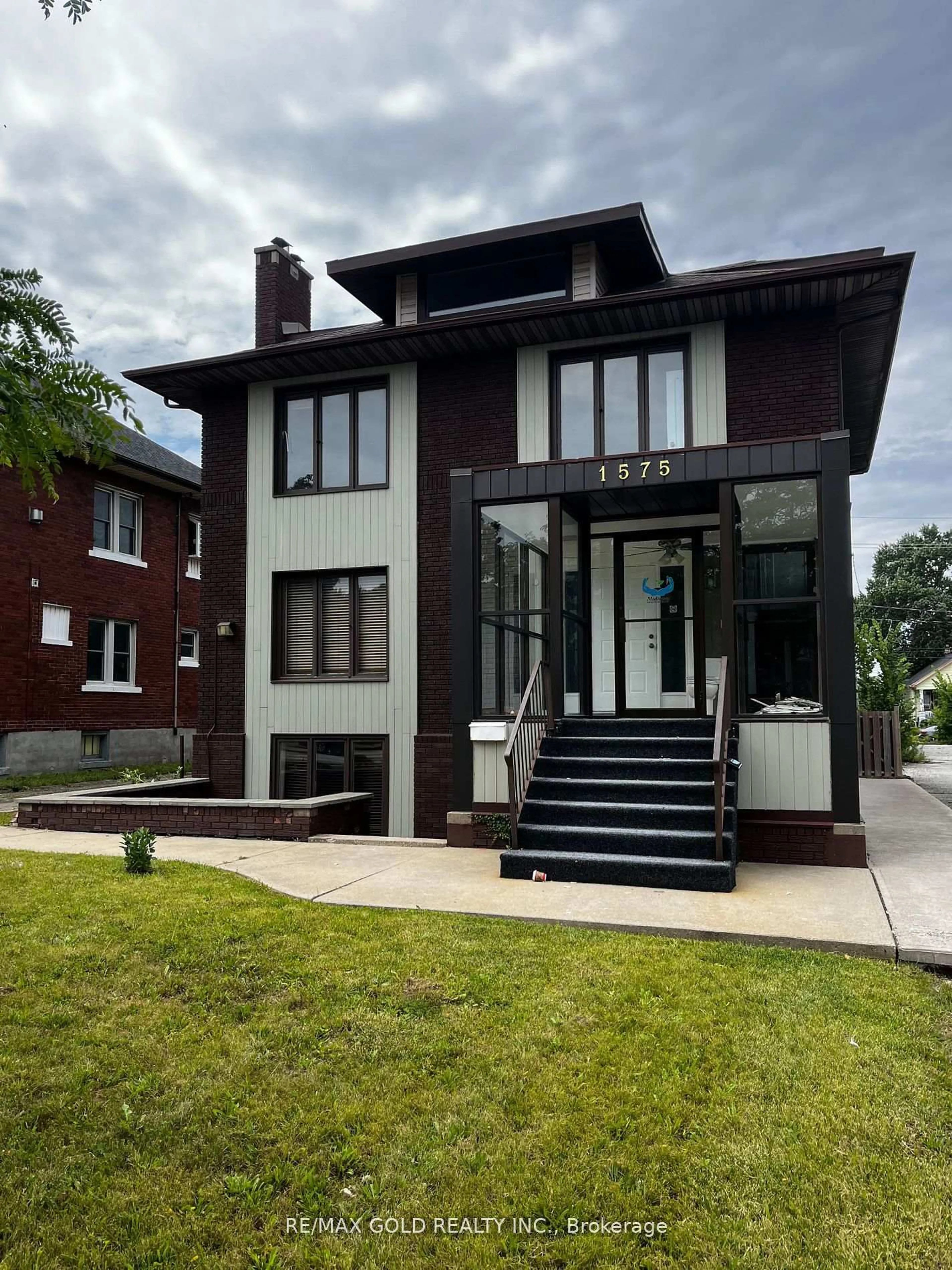 Home with brick exterior material, street for 1575 Ouellette Ave, Windsor Ontario N8X 1K5