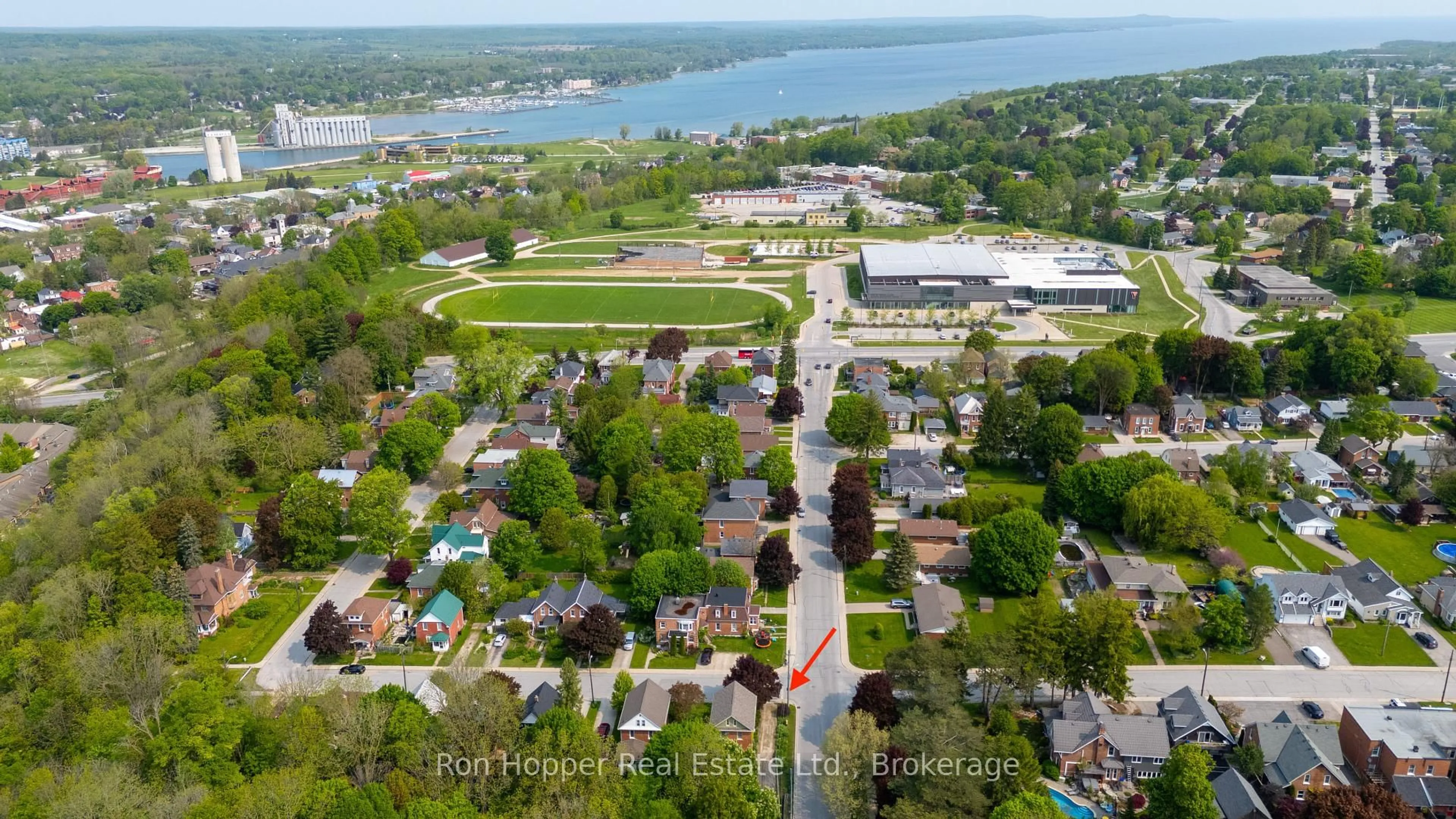 A pic from outside/outdoor area/front of a property/back of a property/a pic from drone, water/lake/river/ocean view for 695 9th St, Owen Sound Ontario N4K 1P8