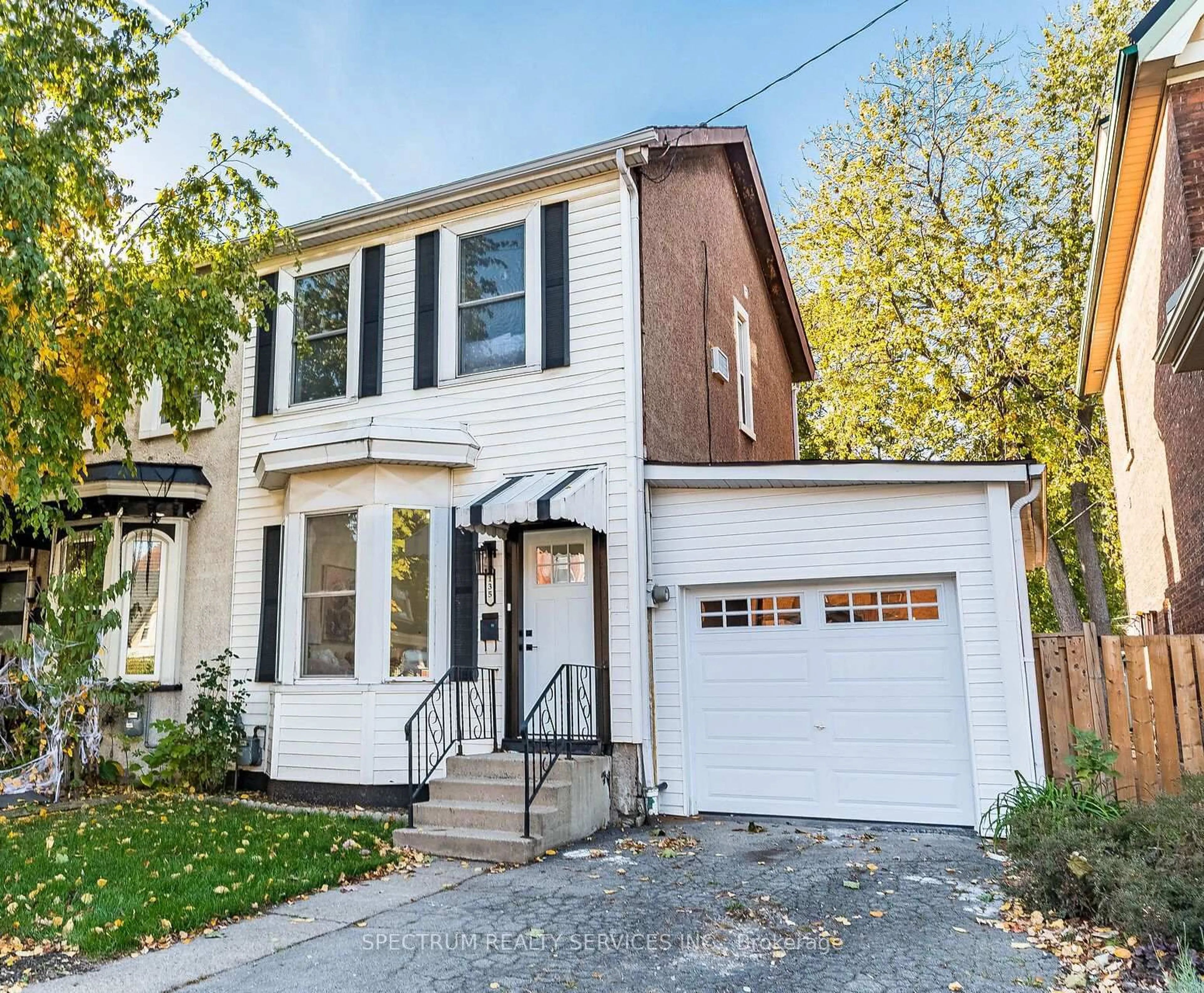 Home with brick exterior material, street for 135 East Ave, Hamilton Ontario L8L 5H8