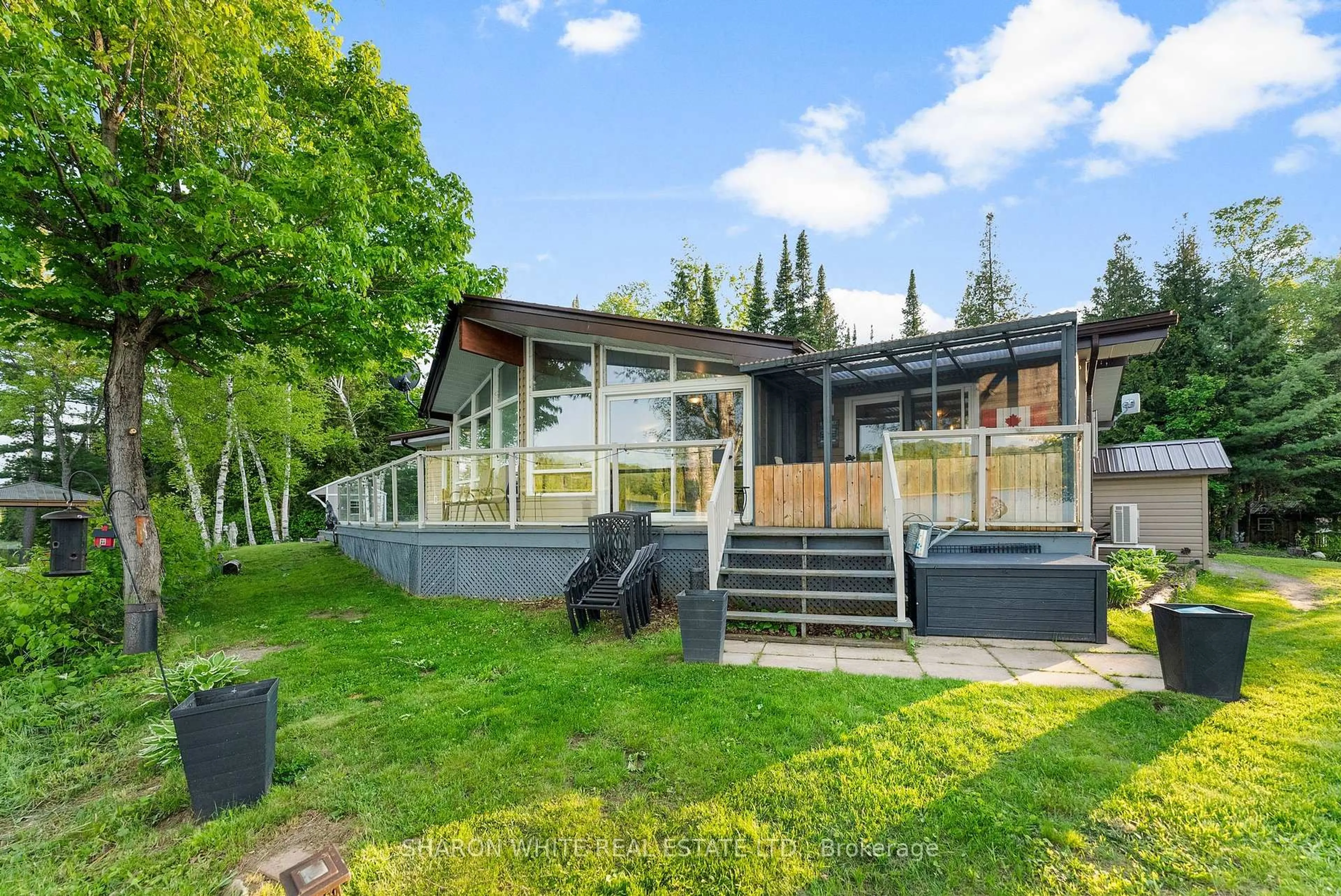 A pic from outside/outdoor area/front of a property/back of a property/a pic from drone, unknown for 44A Aryhart Lake Rd, Bancroft Ontario K0L 1C0