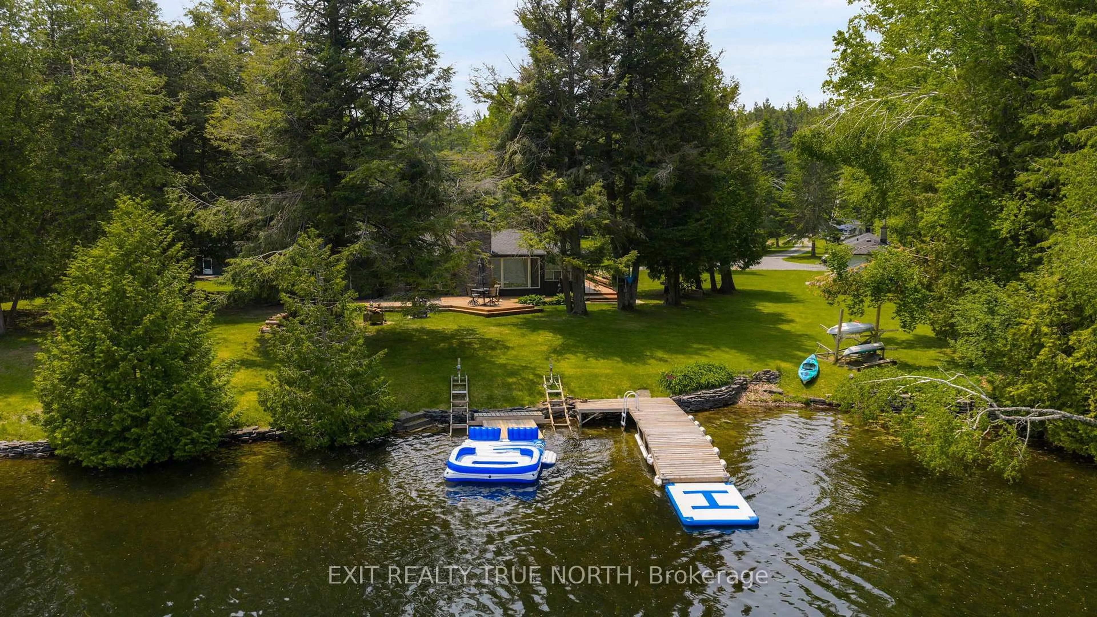 A pic from outside/outdoor area/front of a property/back of a property/a pic from drone, water/lake/river/ocean view for 22 Cardinal Dr, Kawartha Lakes Ontario K0M 2T0
