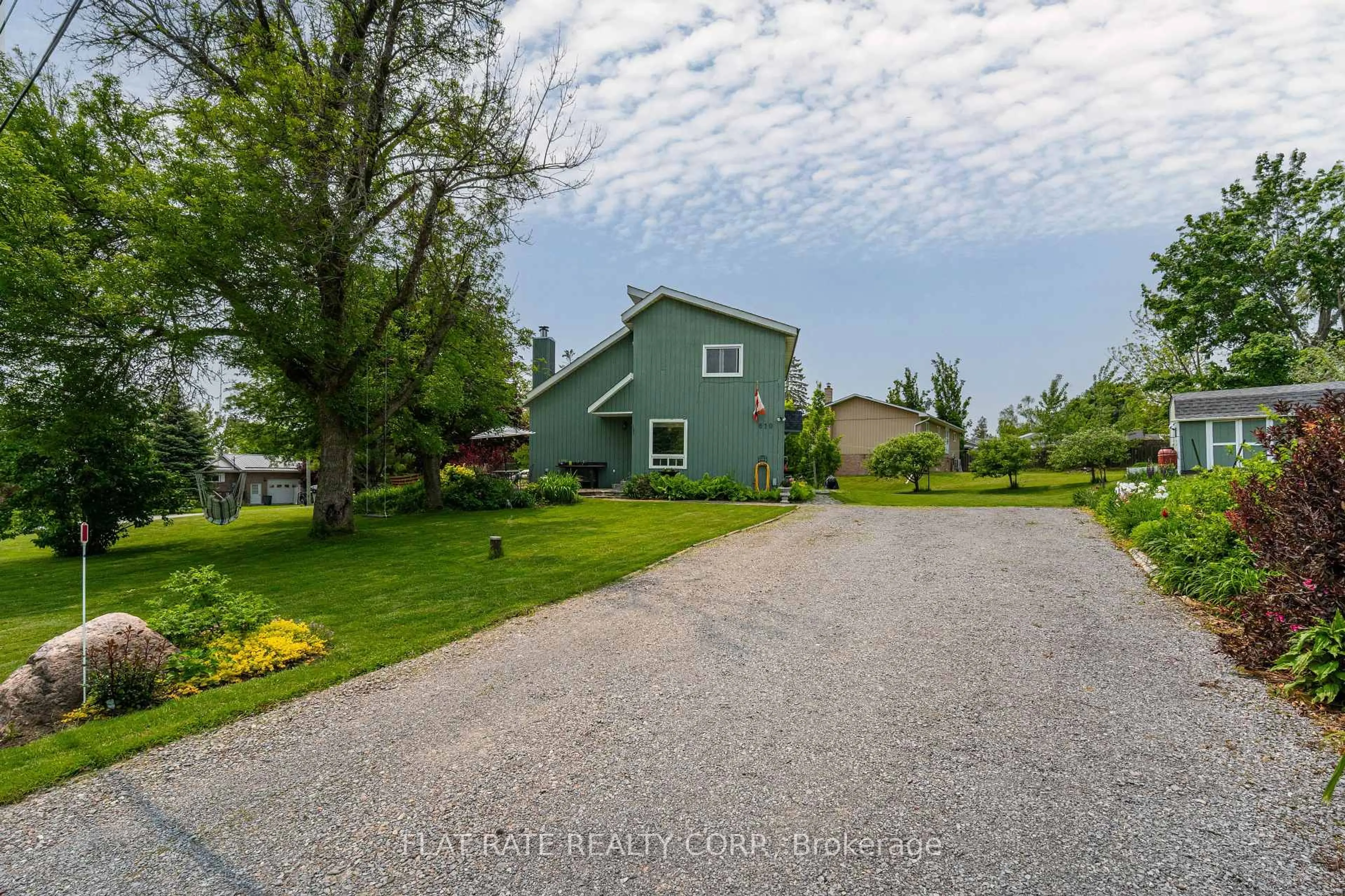A pic from outside/outdoor area/front of a property/back of a property/a pic from drone, street for 610 Brick Rd, Selwyn Ontario K0L 1T0