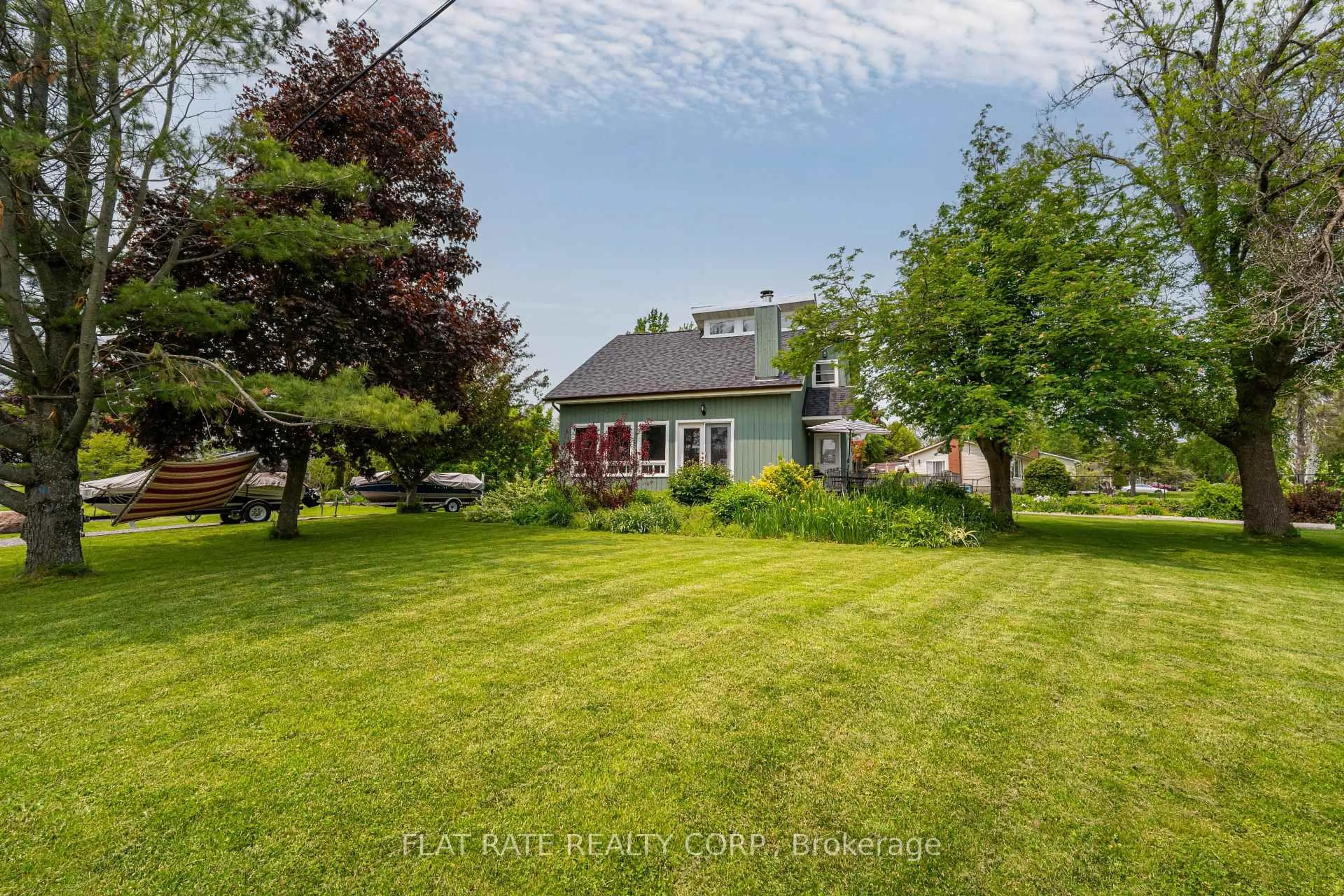A pic from outside/outdoor area/front of a property/back of a property/a pic from drone, street for 610 Brick Rd, Selwyn Ontario K0L 1T0