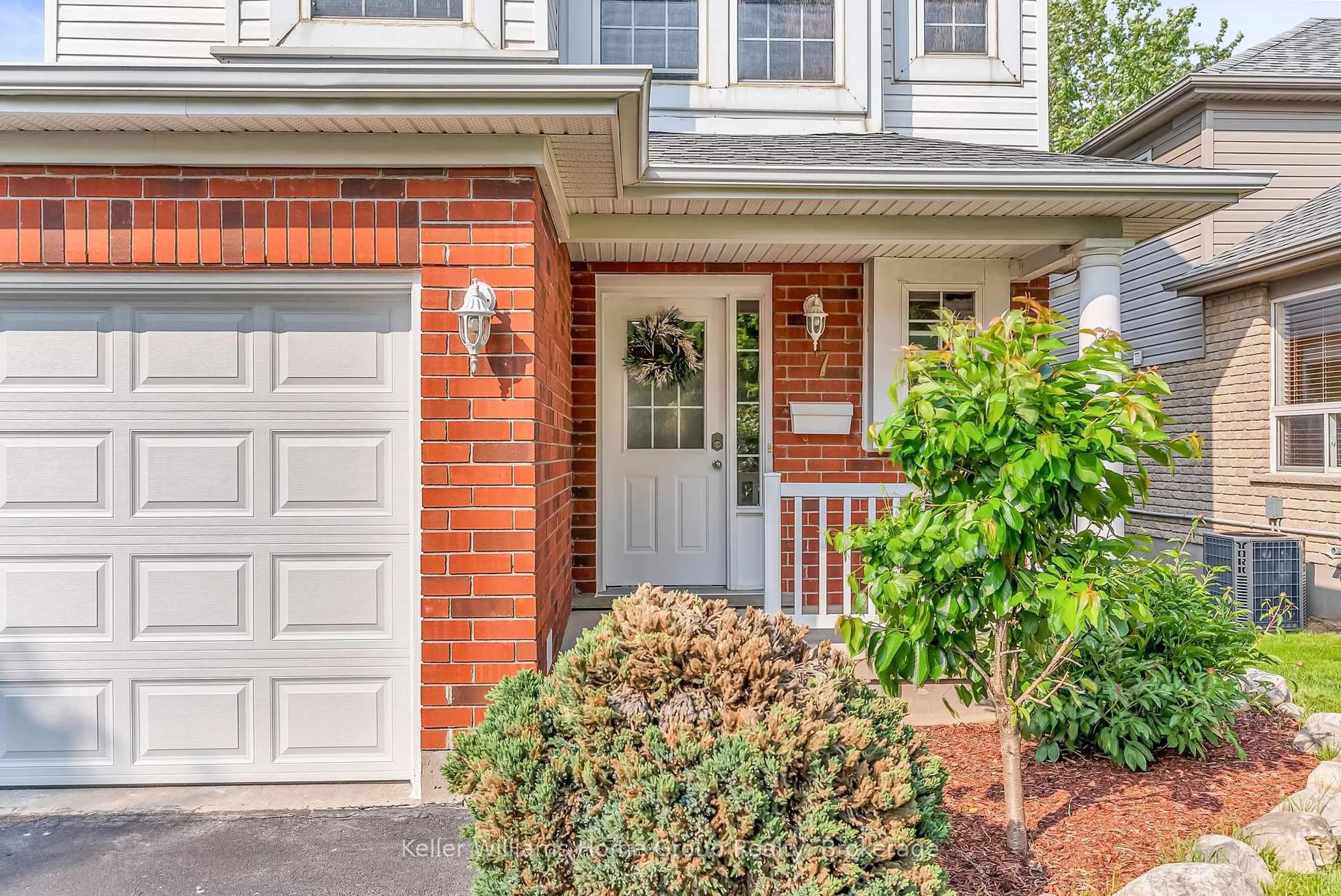 Home with brick exterior material, street for 7 Evans Dr, Guelph Ontario N1L 1L8