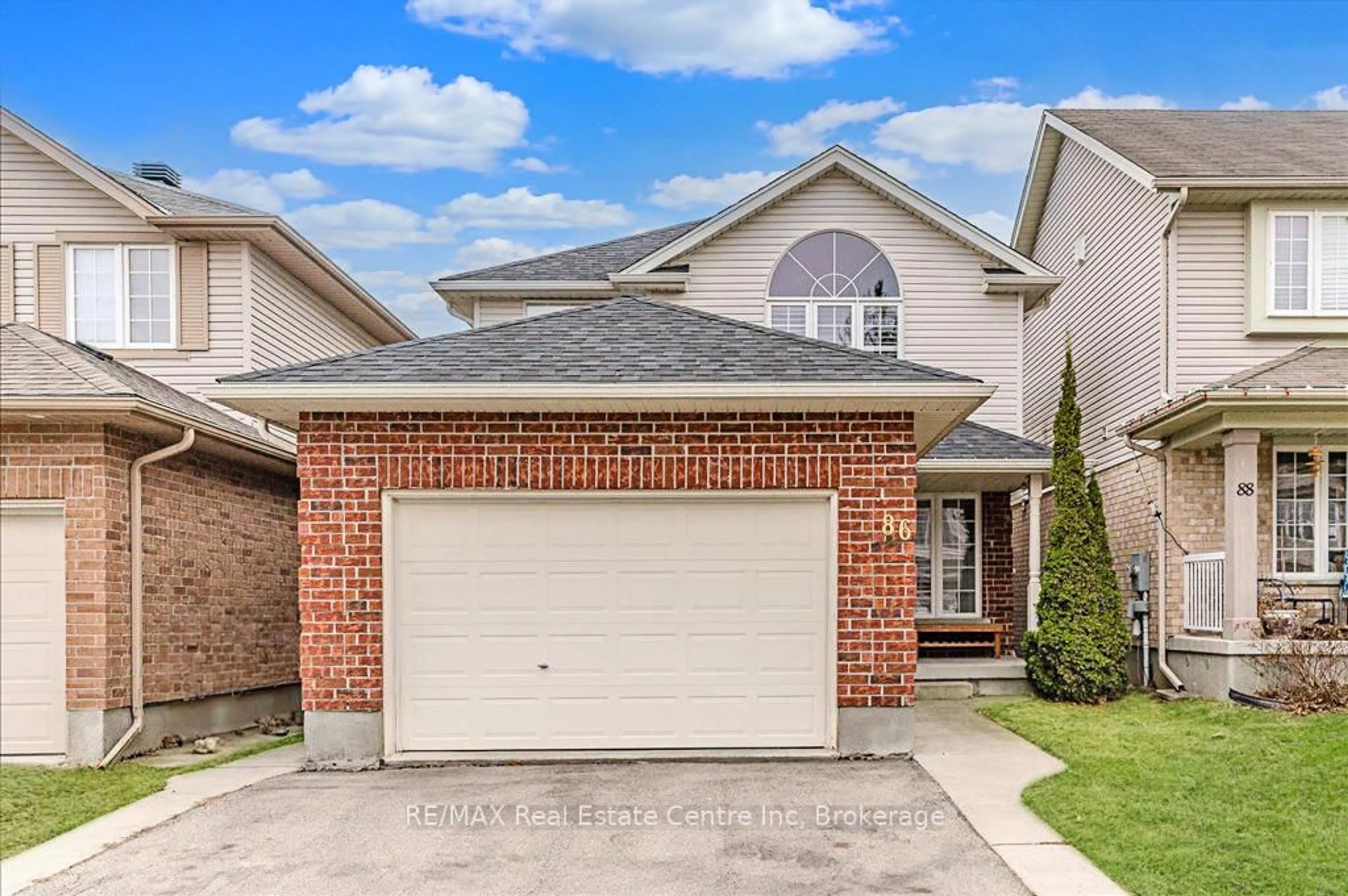 Home with brick exterior material, street for 86 Davis St, Guelph Ontario N1E 0G2