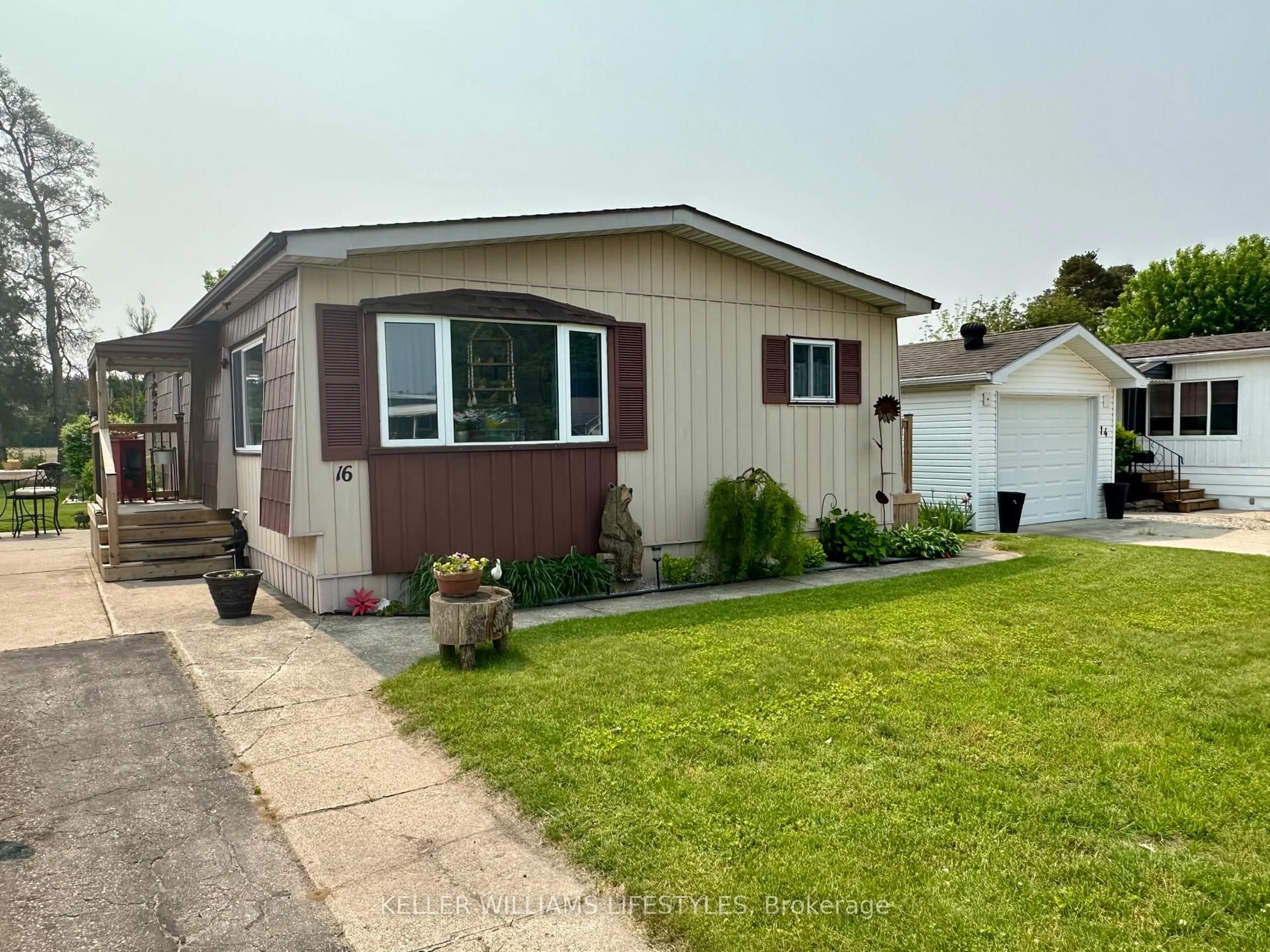 Home with vinyl exterior material, street for 16 VELMA St, Strathroy-Caradoc Ontario N7G 3P4