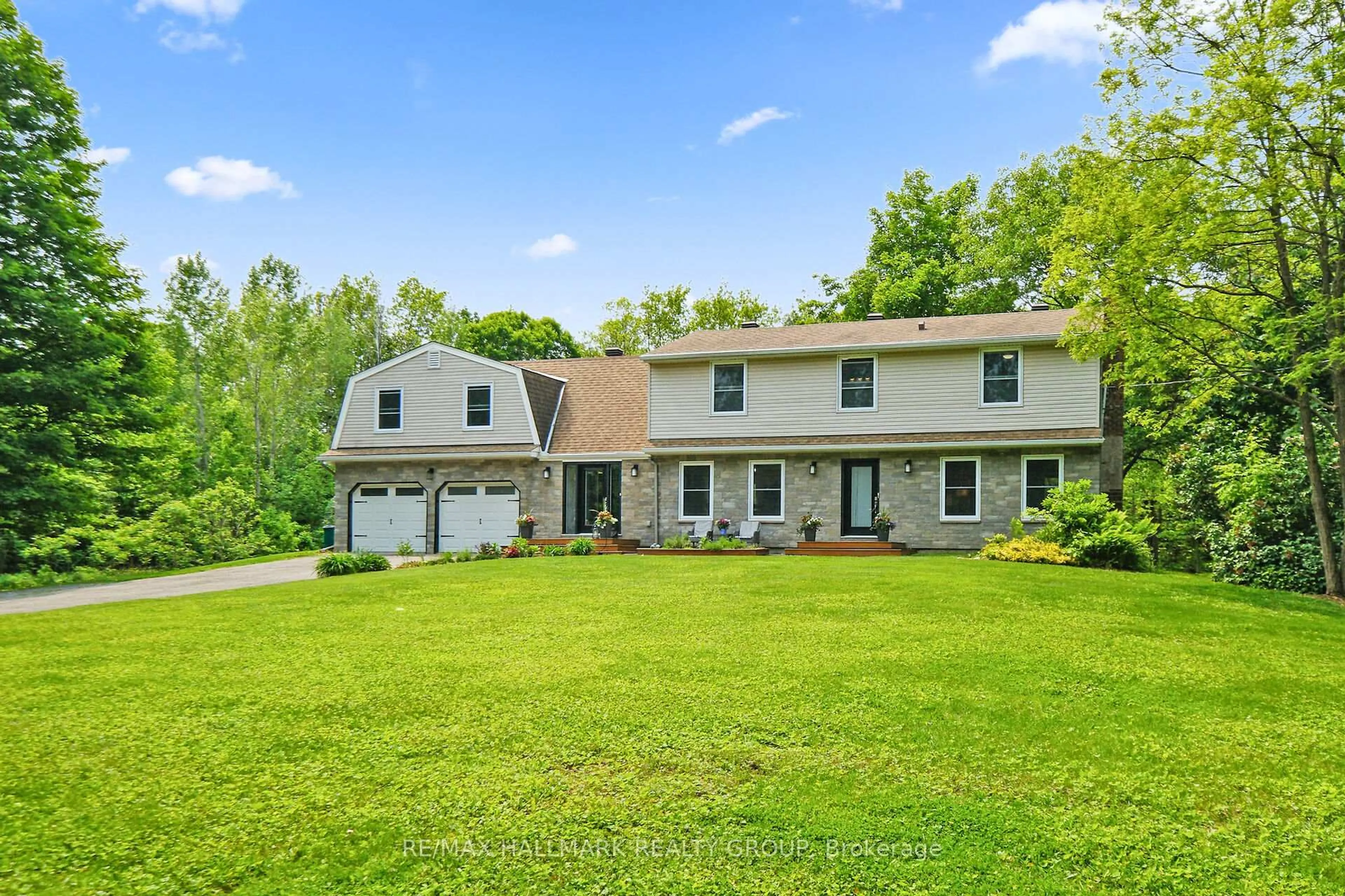 Home with vinyl exterior material, street for 1430 Royal Maple Dr, Cumberland Ontario K4C 1B5